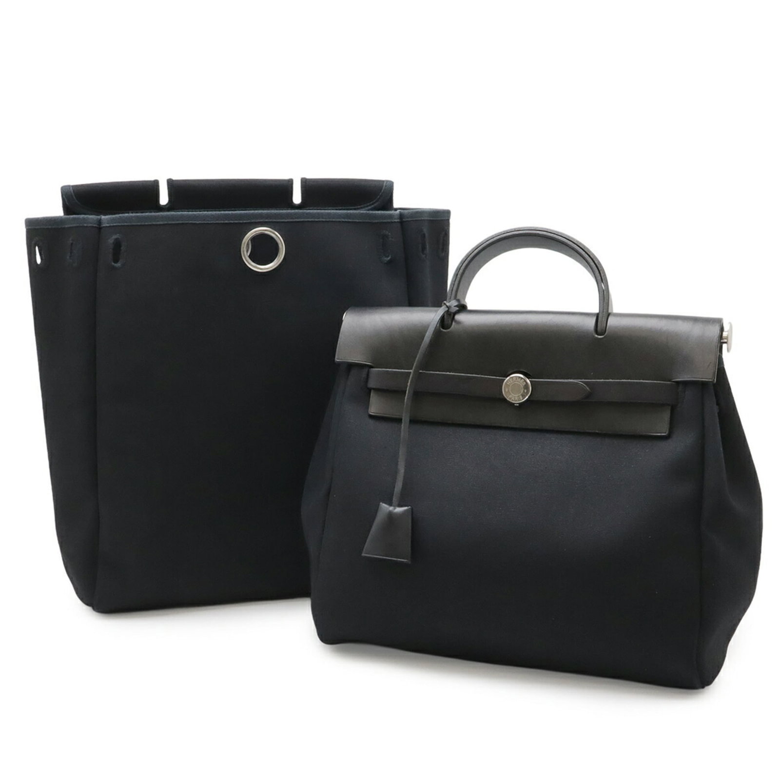 Hermes Leather Handbag Toile Officier Backpack: Hermes Leather Handbag Toile Officier Backpack Experience the timeless elegance of Herm?s with this stunning Toile Officier leather backpack, expertly crafted from rich black leather and adorned with