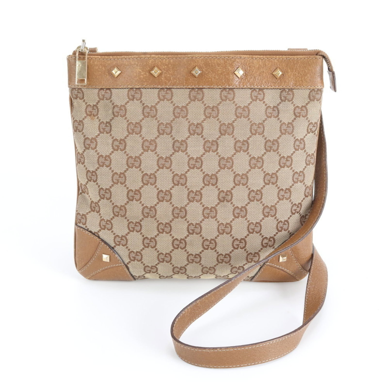 Leather - Gucci Handbag - Shoulder Bag Gg Canvas: Leather - Gucci Handbag - Shoulder Bag Gg Canvas A timeless Gucci shoulder bag in rich brown leather, crafted from high-quality Gg Canvas for a luxurious feel. With its classic design and spacious int