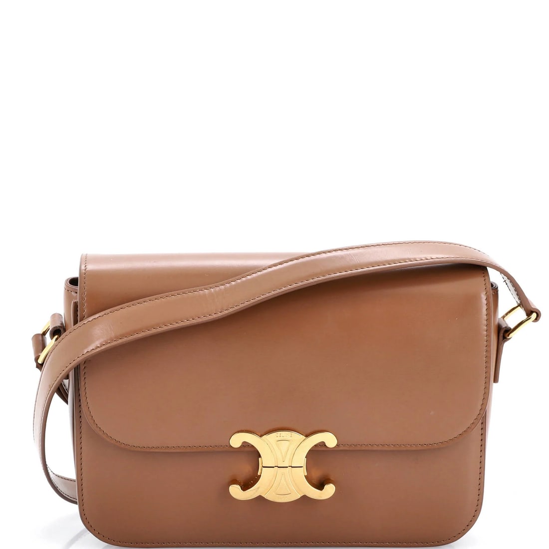 Celine Triomphe Large Smooth Calfskin Shoulder Bag: Celine Triomphe Large Smooth Calfskin Shoulder Bag Experience the timeless elegance of the Celine Triomphe Large Smooth Calfskin Shoulder Bag, boasting a rich brown leather exterior with subtle gold h