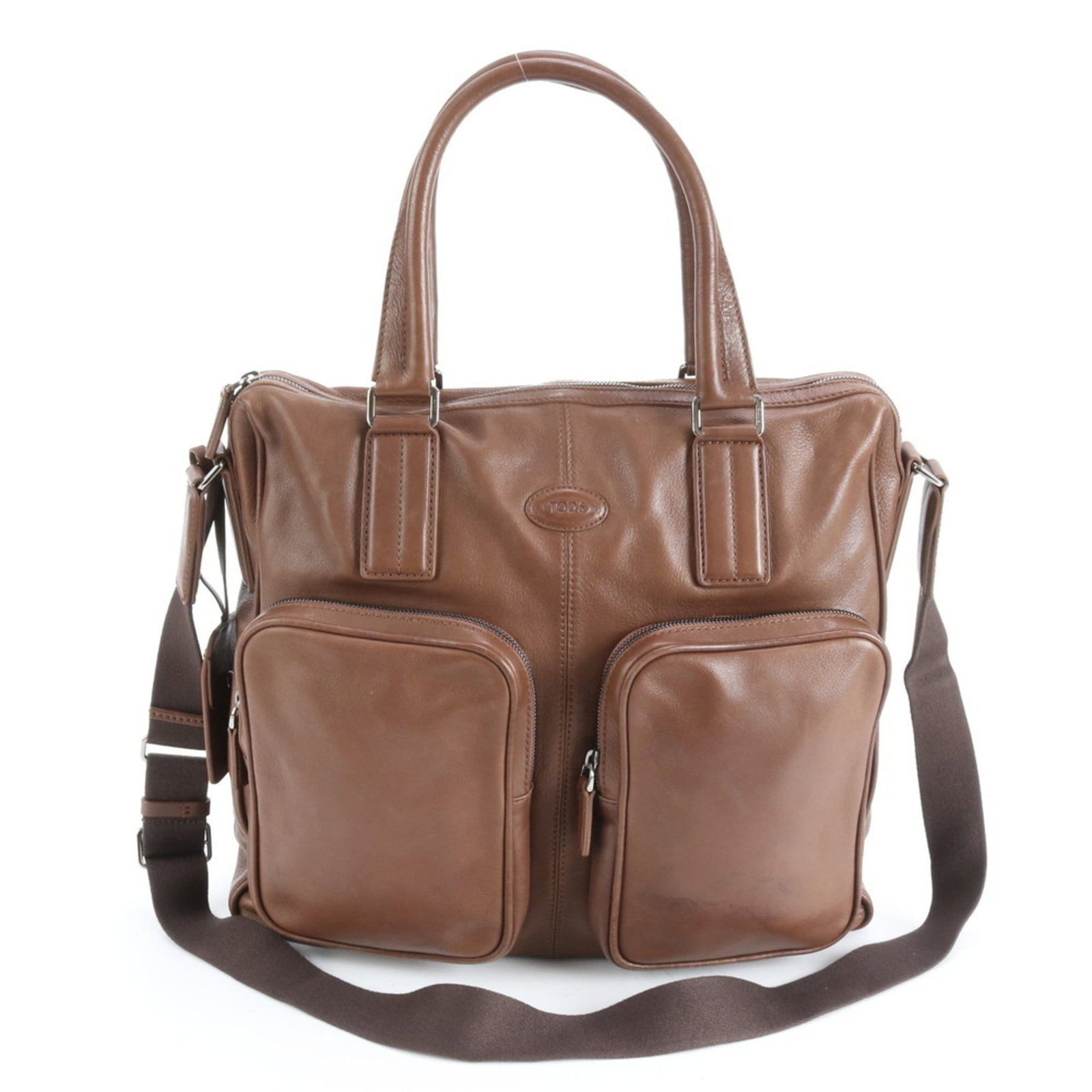 Tod's Leather Briefcase and Tote Bag: Tod's Leather Briefcase and Tote Bag A timeless classic, this Tod's leather briefcase and tote bag is crafted from rich, supple brown leather that develops a beautiful patina with age. With its sturdy