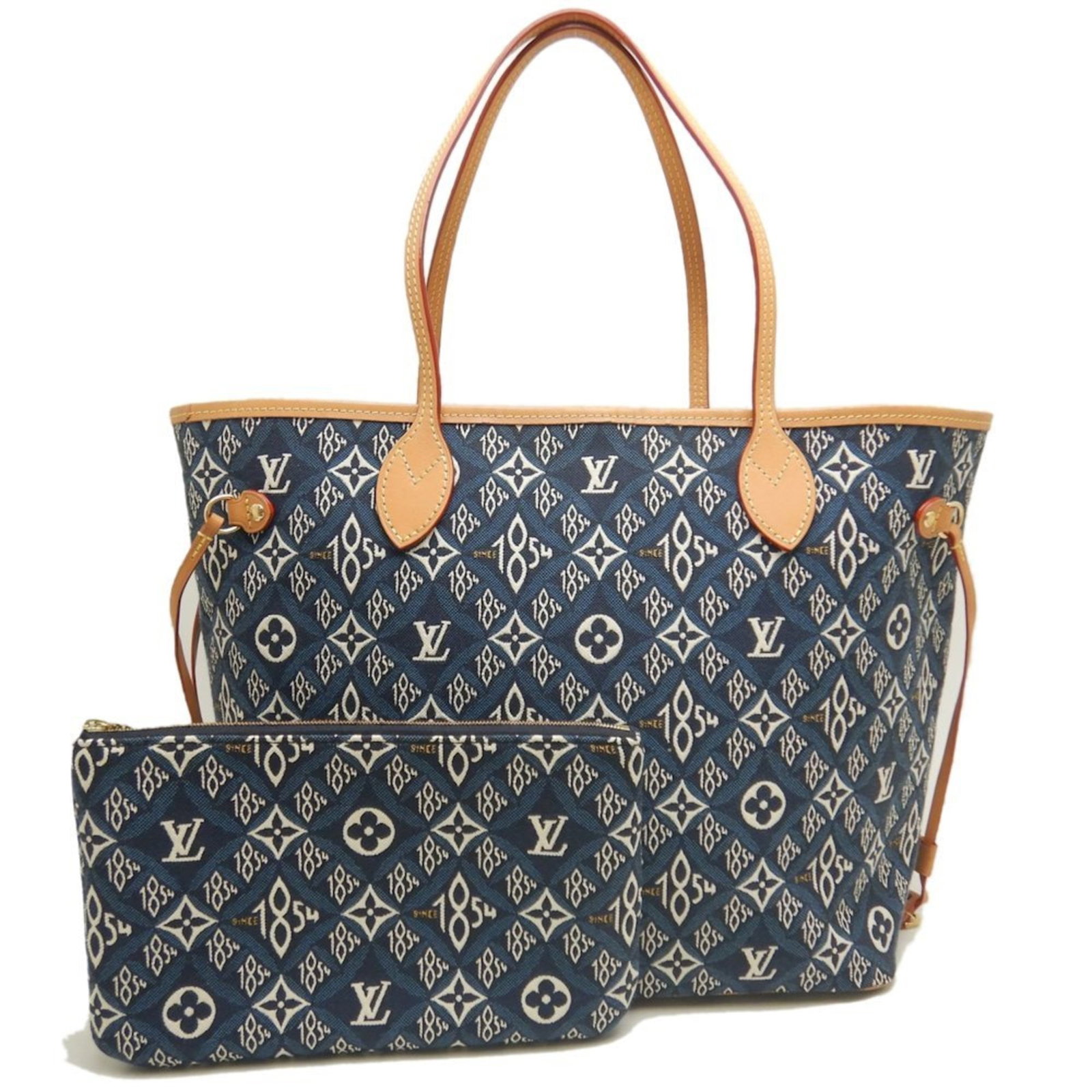 Louis Vuitton Monogram Cotton Canvas Tote Bag: Louis Vuitton Monogram Cotton Canvas Tote Bag A stylish and iconic Louis Vuitton tote bag, this blue monogram cotton canvas bag boasts the brand's signature distinctive design. With its classic 11x12