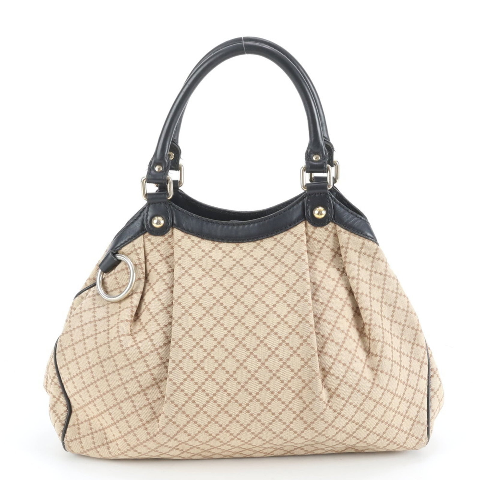 Gucci Tote Bag in Leather and Canvas: Gucci Tote Bag in Leather and Canvas Elevate your everyday style with this pre-loved Gucci tote bag, boasting a chic combination of leather and canvas in a timeless beige hue. Its spacious interior an