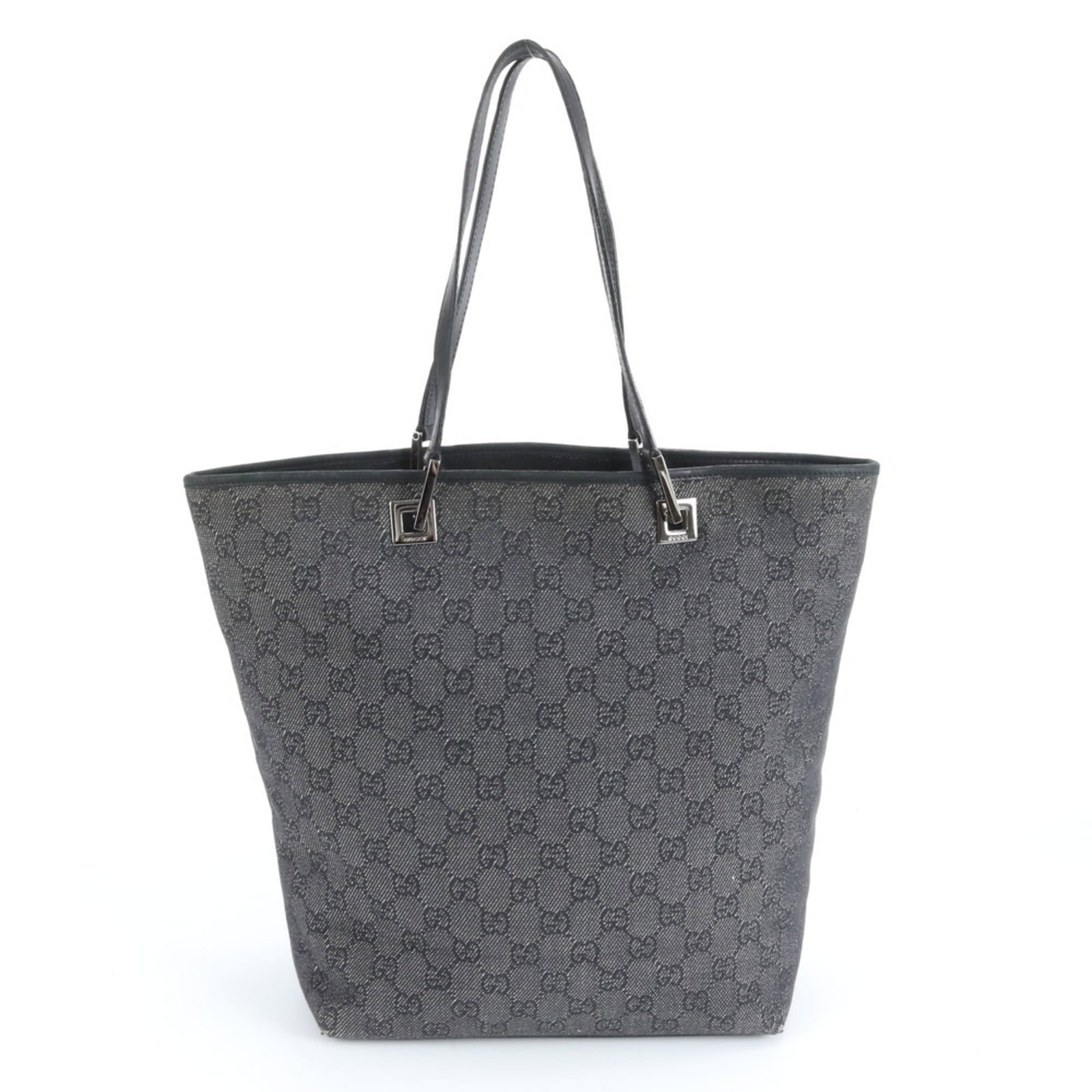 Leather - Gucci Handbag - Tote Bag Gg Canvas: Leather - Gucci Handbag - Tote Bag Gg Canvas A sleek and sophisticated Gucci tote bag, crafted from high-quality Gg Canvas and luxurious leather, adds a touch of timeless elegance to any outfit. With