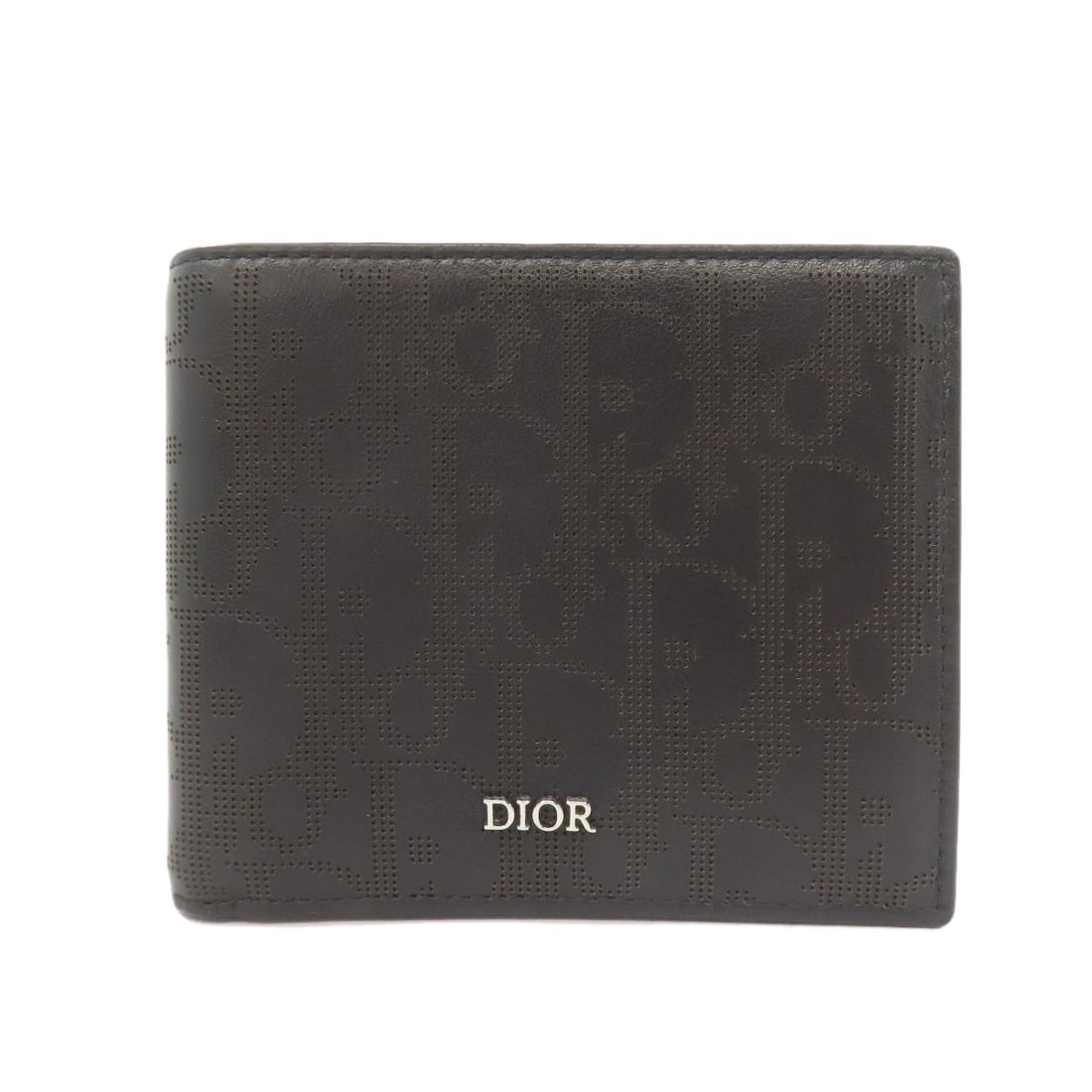 Christian Dior Leather Bifold Wallet with Trotter Pattern and No Coin Pocket: Christian Dior Leather Bifold Wallet with Trotter Pattern and No Coin Pocket A sleek and sophisticated accessory for the modern gentleman, this Christian Dior leather bifold wallet boasts a timeless d