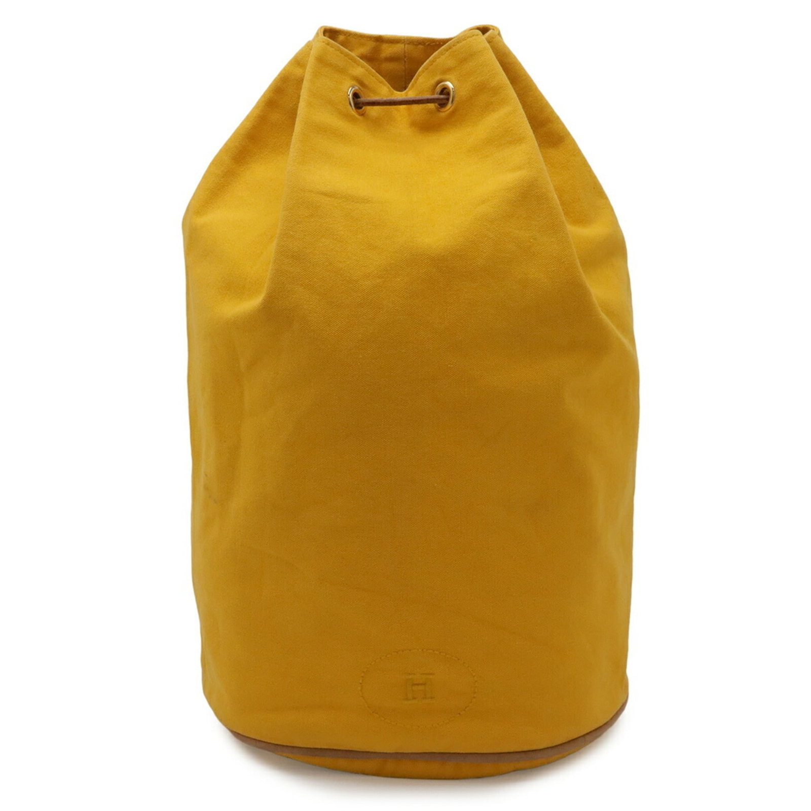 Hermes Canvas and Leather Shoulder Bag: Hermes Canvas and Leather Shoulder Bag A vibrant yellow Hermes shoulder bag, crafted from canvas and leather, adds a pop of color to any outfit. With its classic design and sturdy construction, this i