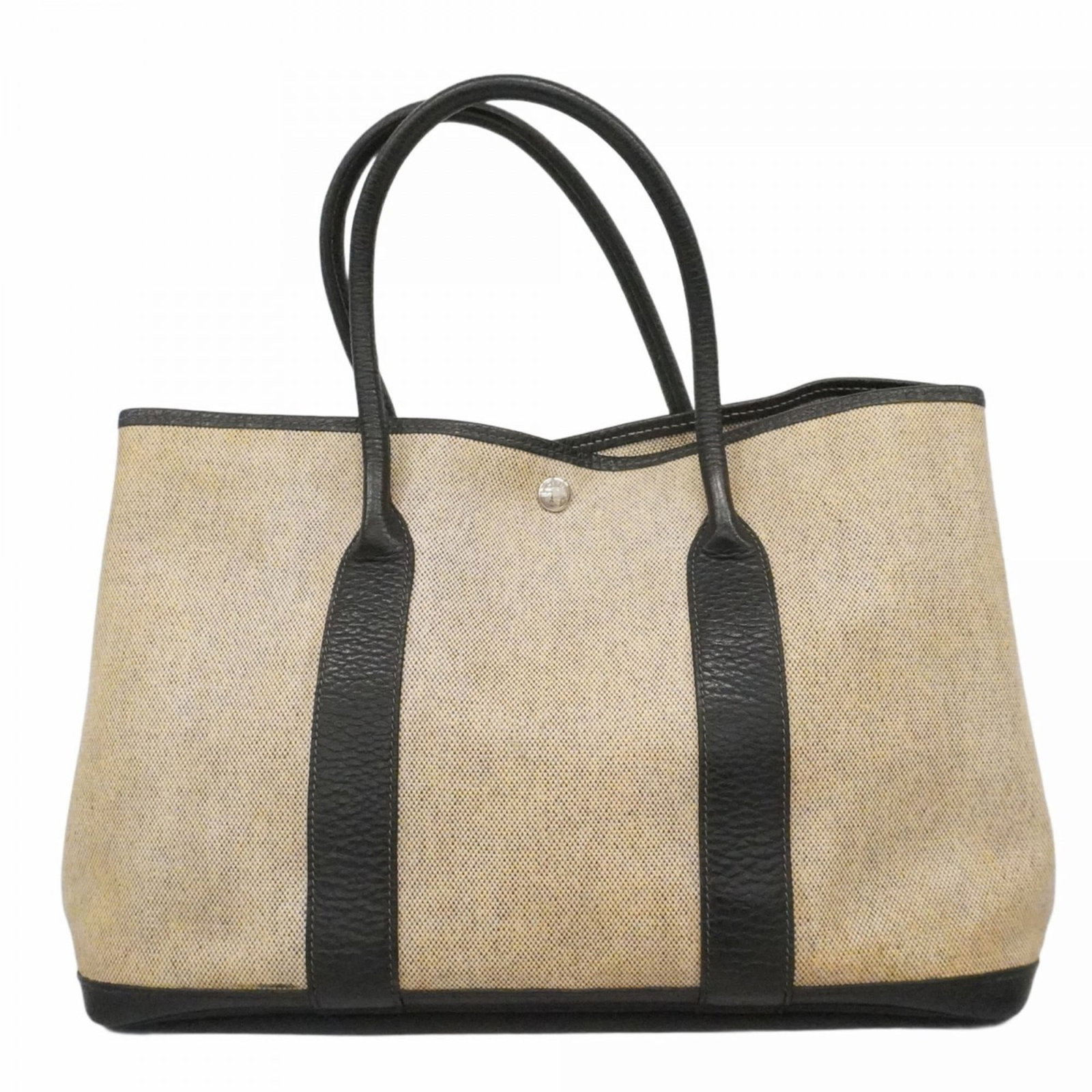 H Hermes Tote Bag Toile: H Hermes Tote Bag Toile A pre-loved Herm?s Toile Tote Bag, perfect for the woman who appreciates timeless elegance and versatility. With its iconic black and silver hardware, this classic tote boasts