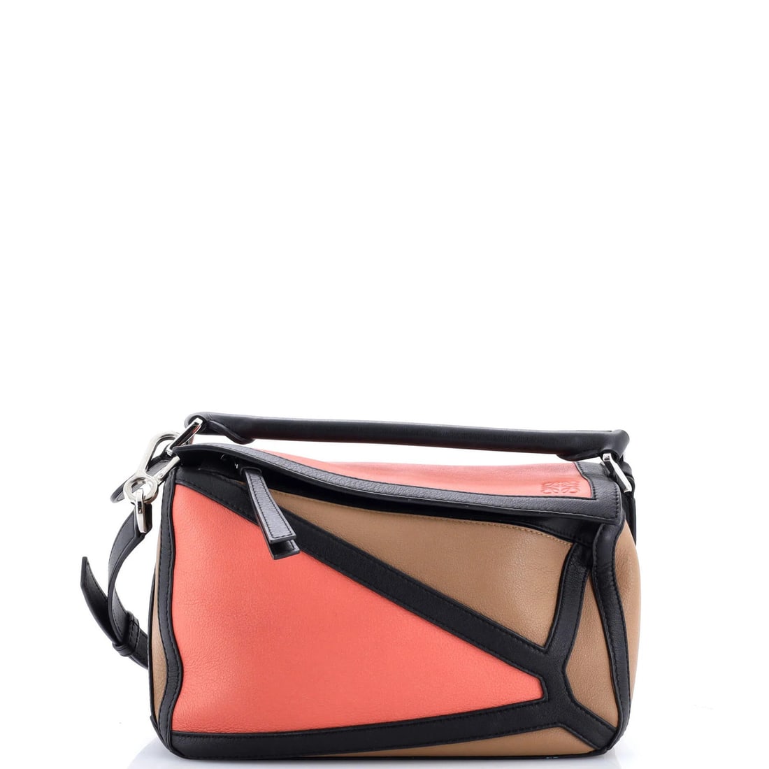 Loewe Puzzle Bag in Small Leather: Loewe Puzzle Bag in Small Leather The iconic Loewe Puzzle Bag is a true design icon, boasting its signature multicolor leather exterior and sleek, modern silhouette. With its adjustable strap and comp