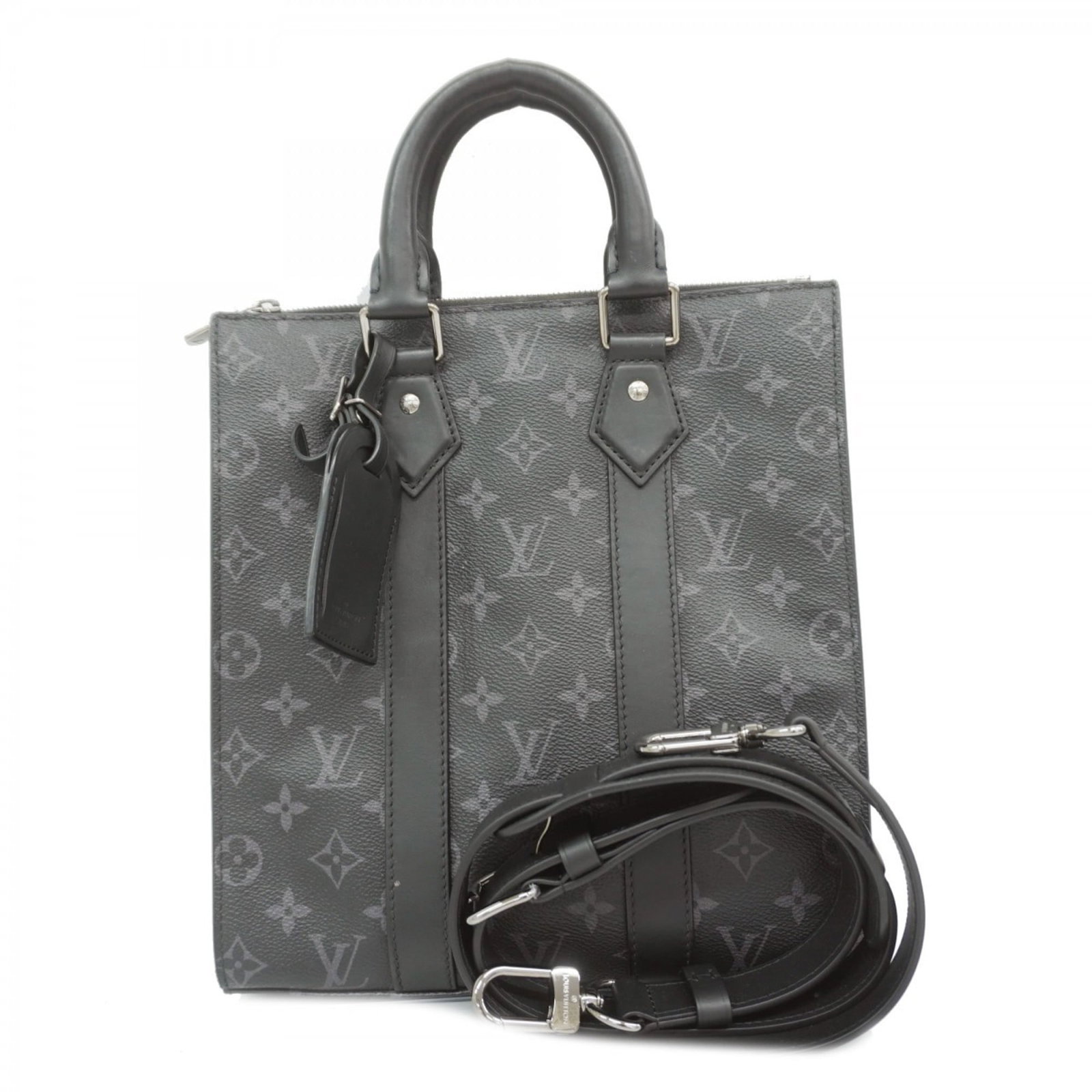 Handbag Louis Vuitton: Handbag Louis Vuitton A sleek and timeless piece, this pre-owned Louis Vuitton handbag boasts the iconic monogram pattern and premium black leather construction that has become synonymous with luxury.