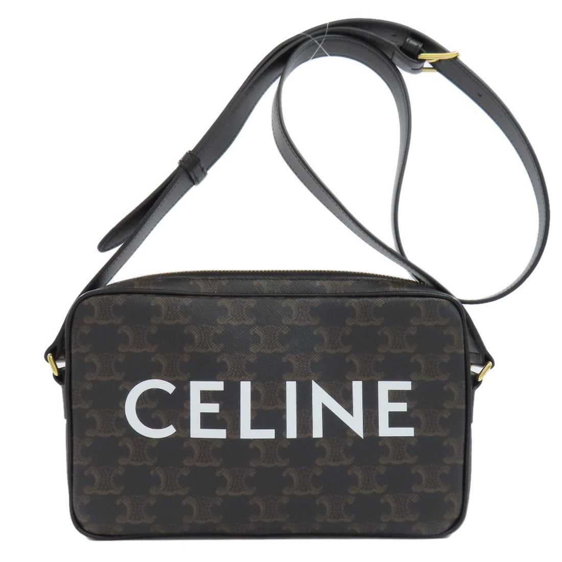 Celine Triomphe Shoulder Bag in PVC: Celine Triomphe Shoulder Bag in PVC Elevate your style with the iconic Celine Triomphe shoulder bag, crafted from premium PVC for a sleek and modern look. This timeless design boasts a rich dark brown