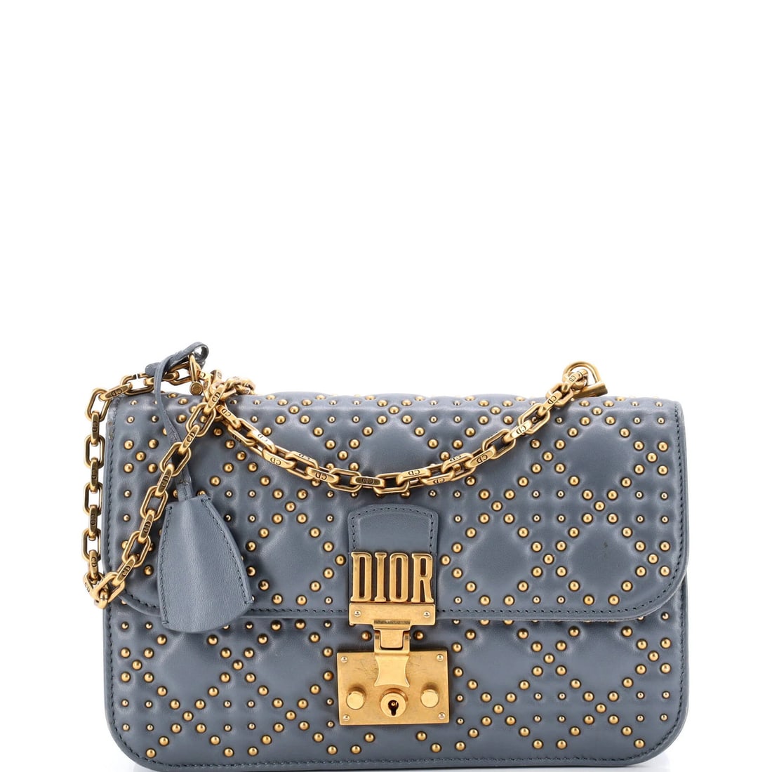 Medium Christian Dior Dioraddict Flap Bag Cannage Studded Lambskin: Medium Christian Dior Dioraddict Flap Bag Cannage Studded Lambskin A stunning medium-sized Dioraddict Flap Bag in rich blue lambskin, adorned with intricate studded details and aged gold hardware, add
