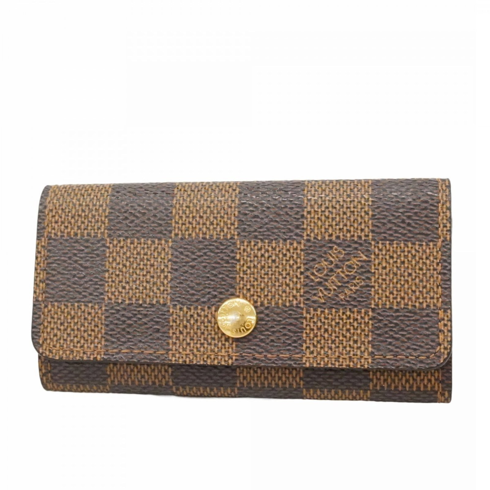 Keycase Louis Vuitton: Keycase Louis Vuitton A pre-owned Louis Vuitton Keycase in Ebene leather, perfect for adding a touch of luxury to your daily essentials. With its classic design and durable construction, this stylish