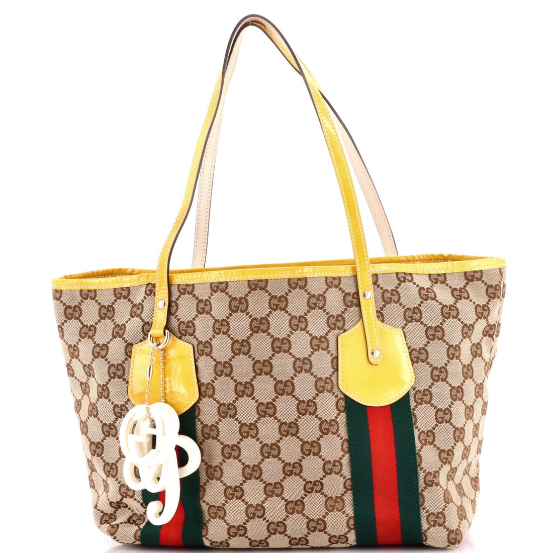 Gucci Jolie Large Web Tote in GG Canvas: Gucci Jolie Large Web Tote in GG Canvas The Gucci Jolie Large Web Tote is a vibrant and stylish accessory that boasts the iconic GG Canvas design, perfect for adding a pop of yellow to your daily rout