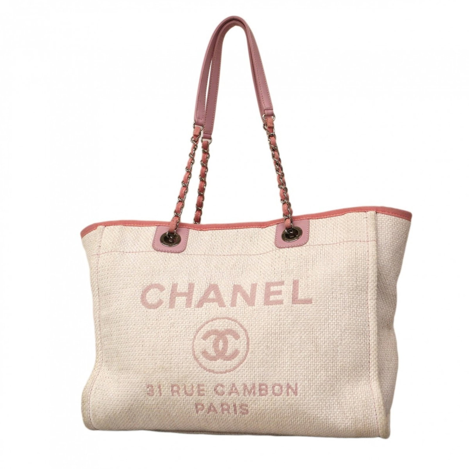 Chanel Tote Bag in Straw: Chanel Tote Bag in Straw A chic and timeless piece, this Chanel straw tote bag boasts the iconic quilted design and signature silver hardware that defines the brand's luxury aesthetic. With its natura