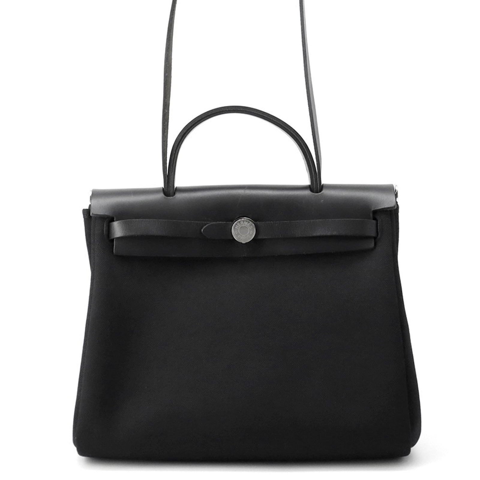 Leather Hermes Handbag Vache: Leather Hermes Handbag Vache A stunning black Vache leather Hermes handbag, exuding timeless elegance and sophistication, boasts a sleek silver flap closure and premium quality craftsmanship that has