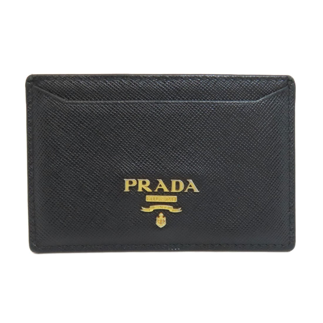 Prada Logo Card Case in Safiano: Prada Logo Card Case in Safiano Elevate your everyday essentials with the iconic Prada Logo Card Case in Safiano, crafted from premium Italian leather that exudes sophistication and durability. The sl
