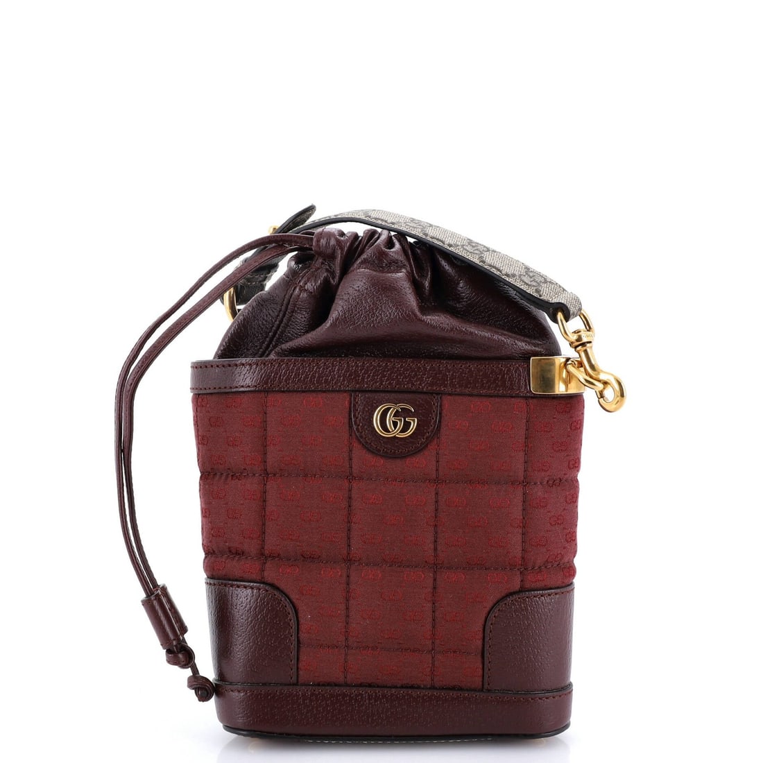 Gucci Mini Quilted Crossbody Bag in GG Canvas and Leather: Gucci Mini Quilted Crossbody Bag in GG Canvas and Leather Elevate your everyday style with the iconic Gucci Mini Quilted Crossbody Bag, boasting a striking combination of GG Canvas and Leather in bold