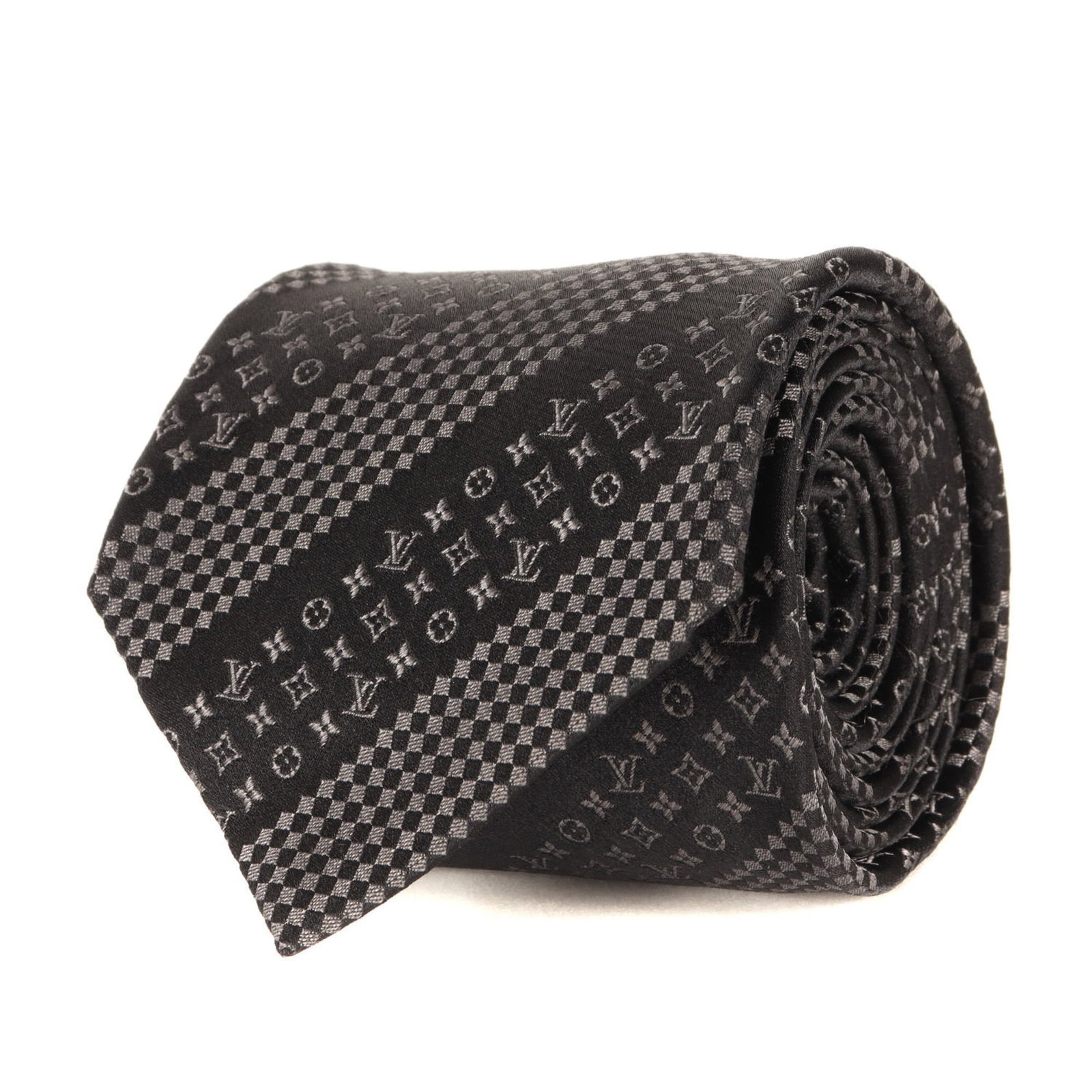 Louis Vuitton Monogram Cravat: Louis Vuitton Monogram Cravat A luxurious touch for any formal occasion, this Louis Vuitton Monogram Cravat boasts the iconic brand's signature monogram pattern in sleek black. Made from high-quality