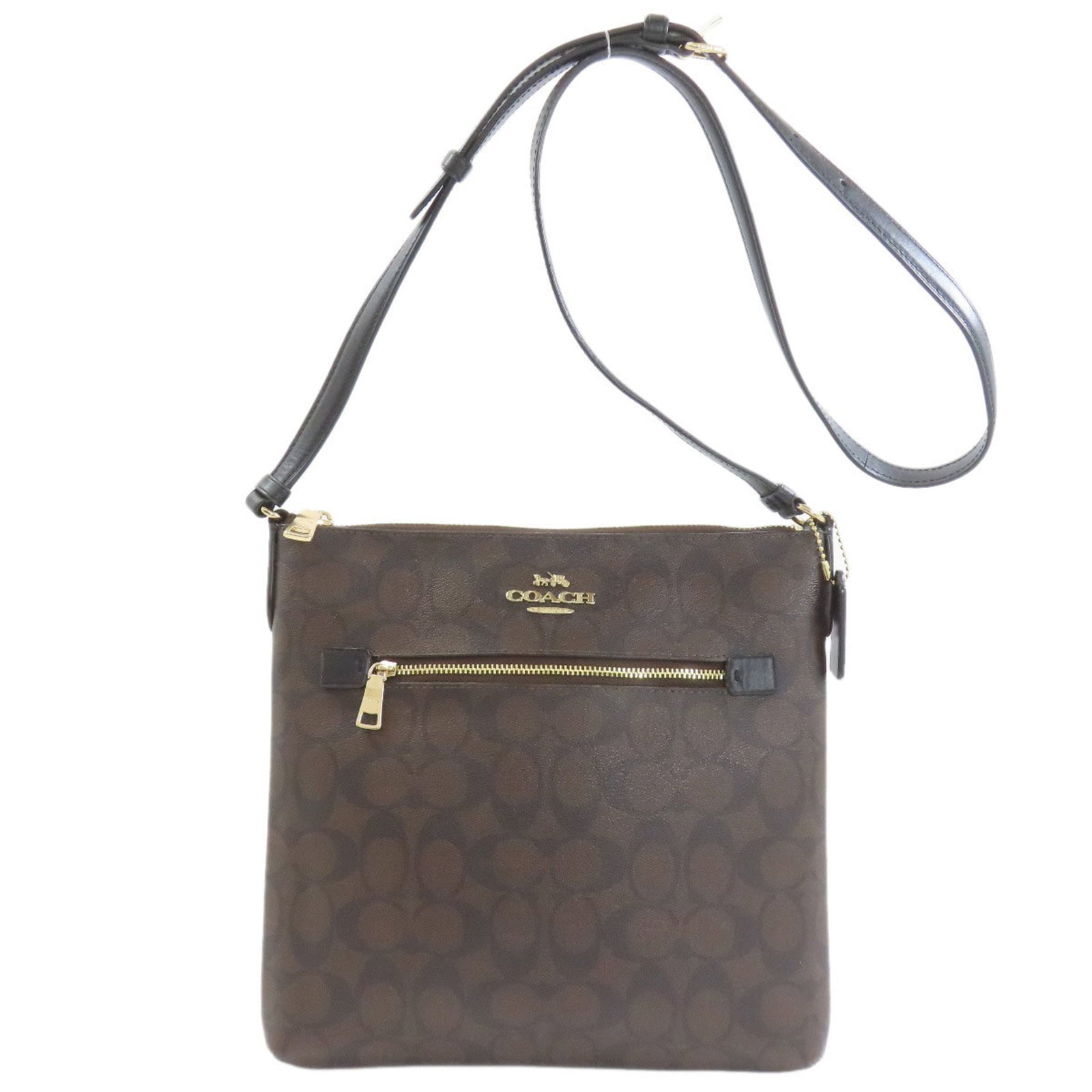Coach Signature Line Shoulder Bag: Coach Signature Line Shoulder Bag Elevate your everyday style with this luxurious Coach Signature Line Shoulder Bag, boasting a rich brown hue and sleek design. The spacious interior features multiple