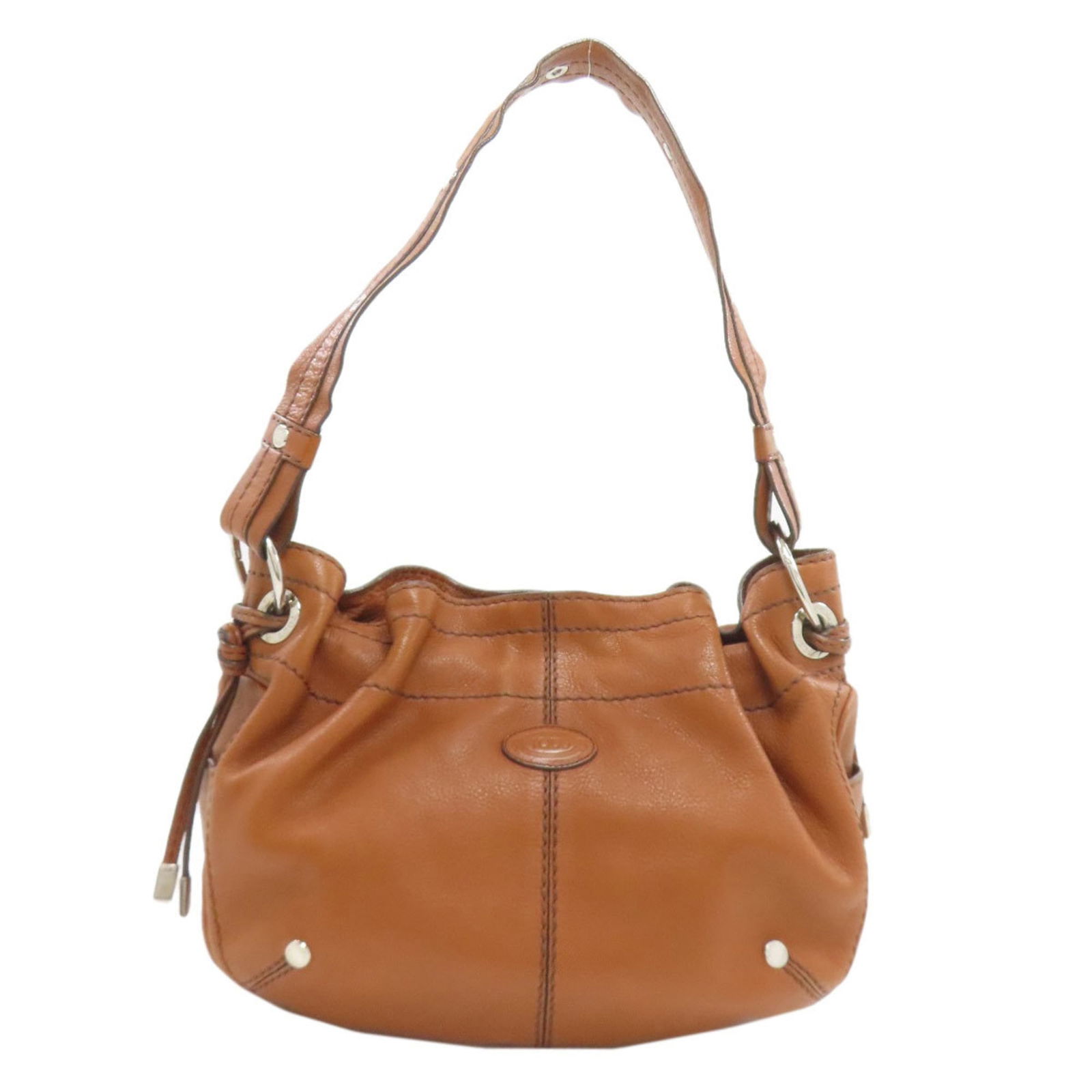 Tod's Shoulder Bag in Leather: Tod's Shoulder Bag in Leather Elevate your everyday style with the timeless Tod's shoulder bag, crafted from rich brown leather that develops a beautiful patina over time. This versatile tote boasts t