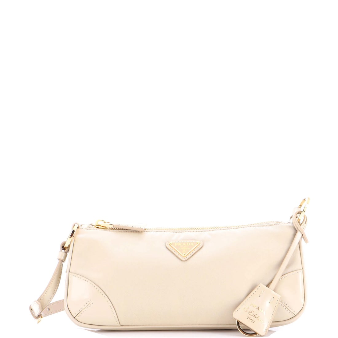 Prada 2002 Re-Edition Nylon & Leather Shoulder Bag: Prada 2002 Re-Edition Nylon & Leather Shoulder Bag Experience the timeless elegance of Prada's 2002 Re-Edition Nylon & Leather Shoulder Bag, reimagined with modern materials and craftsmanship. This ic