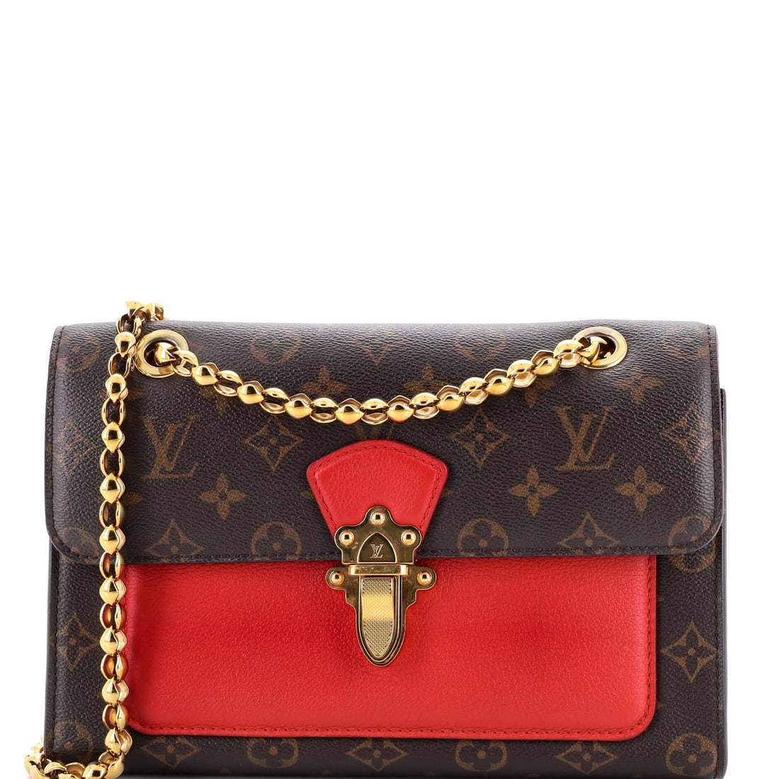 Louis Vuitton Victoire Monogram Canvas & Leather Handbag: Louis Vuitton Victoire Monogram Canvas & Leather Handbag A stunning Louis Vuitton Victoire handbag in bold red leather, boasting the iconic monogram canvas design and sleek shoulder straps. With its c