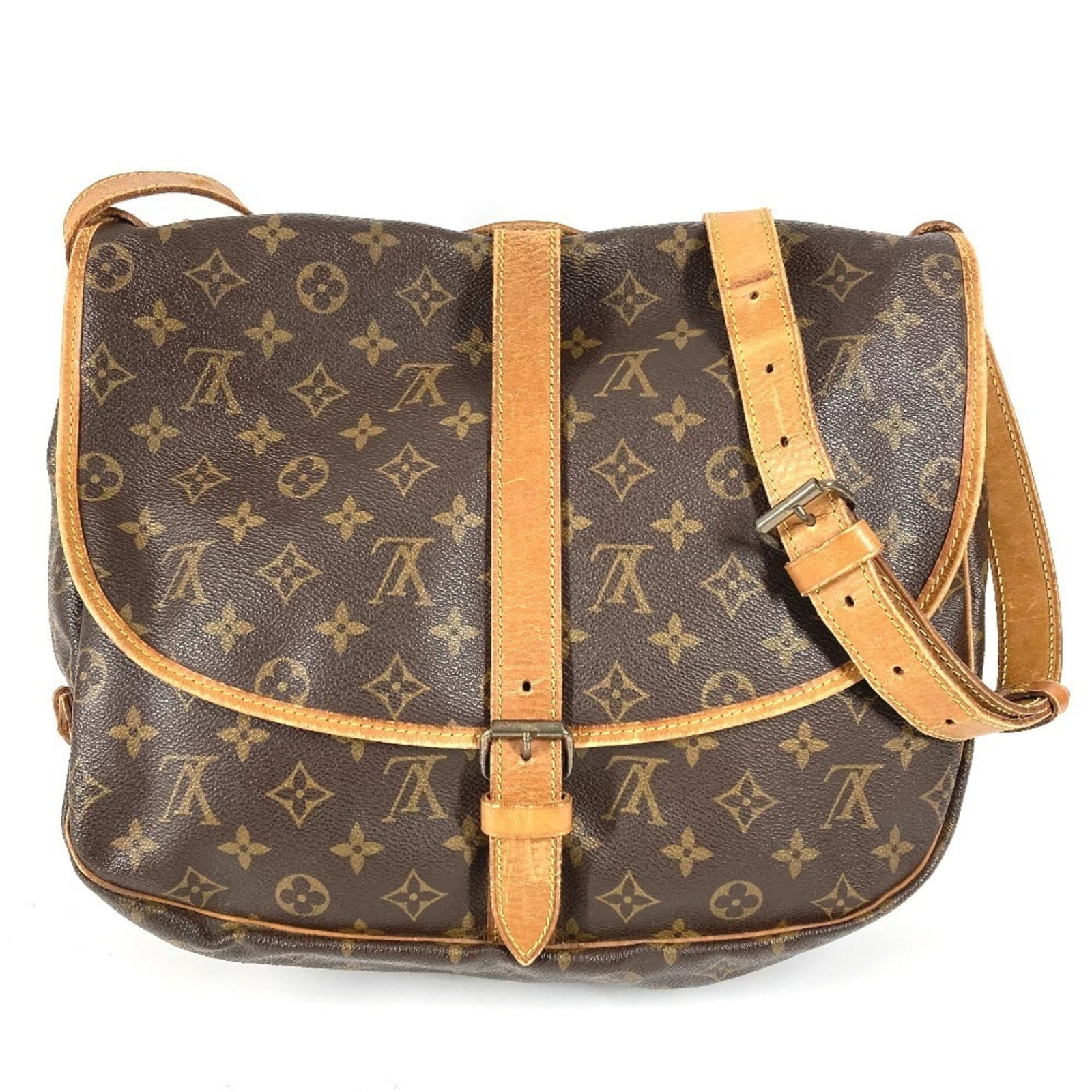 Louis Vuitton Monogram Shoulder Bag: Louis Vuitton Monogram Shoulder Bag A timeless piece of luxury, this Louis Vuitton Monogram Shoulder Bag is a masterclass in understated elegance, boasting the iconic brand's signature monogram patter