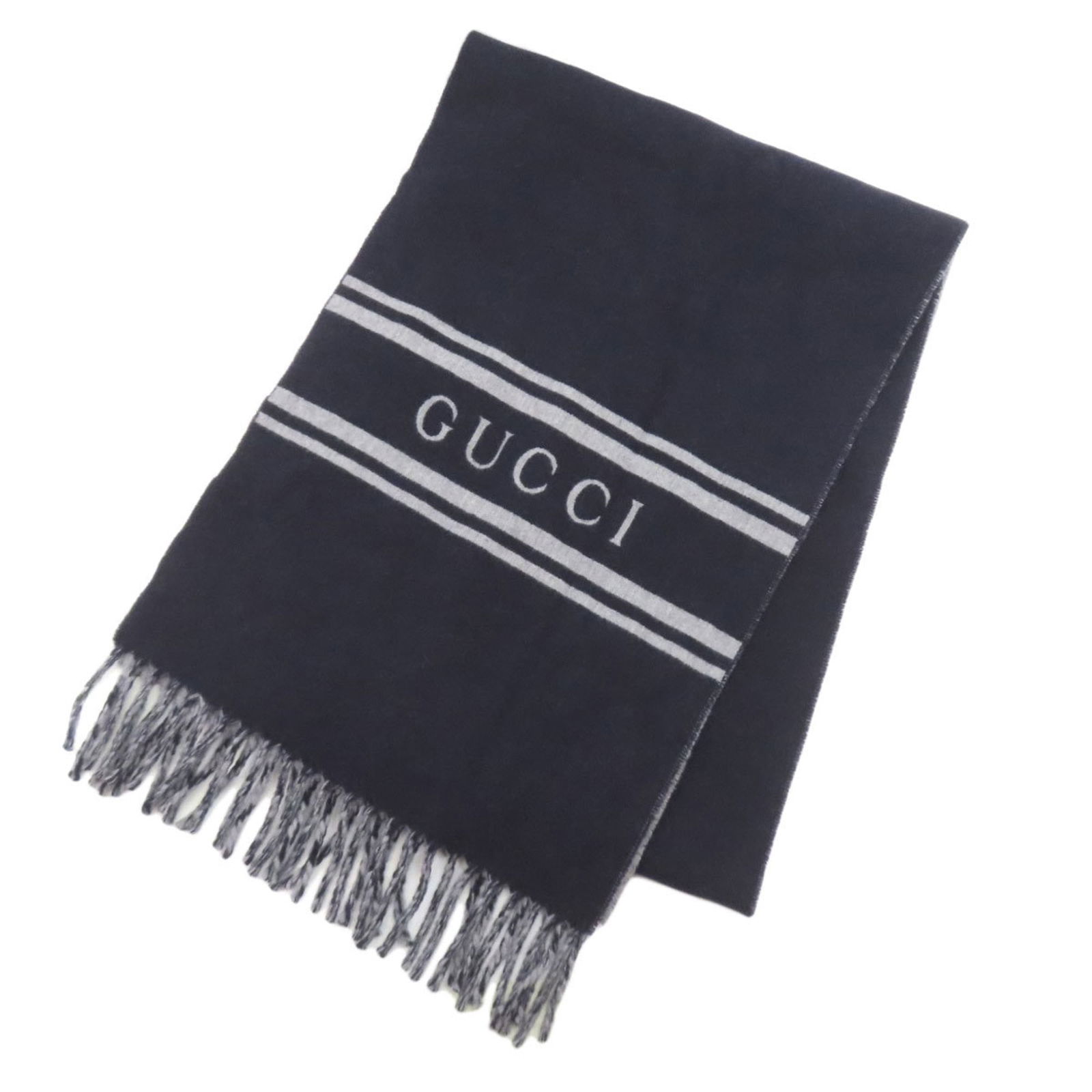 Cashmere Gucci Stole: Cashmere Gucci Stole Experience the opulence of luxury with this stunning cashmere Gucci stole, boasting soft gray and navy hues that exude effortless elegance. Made from sumptuous cashmere, this exqu