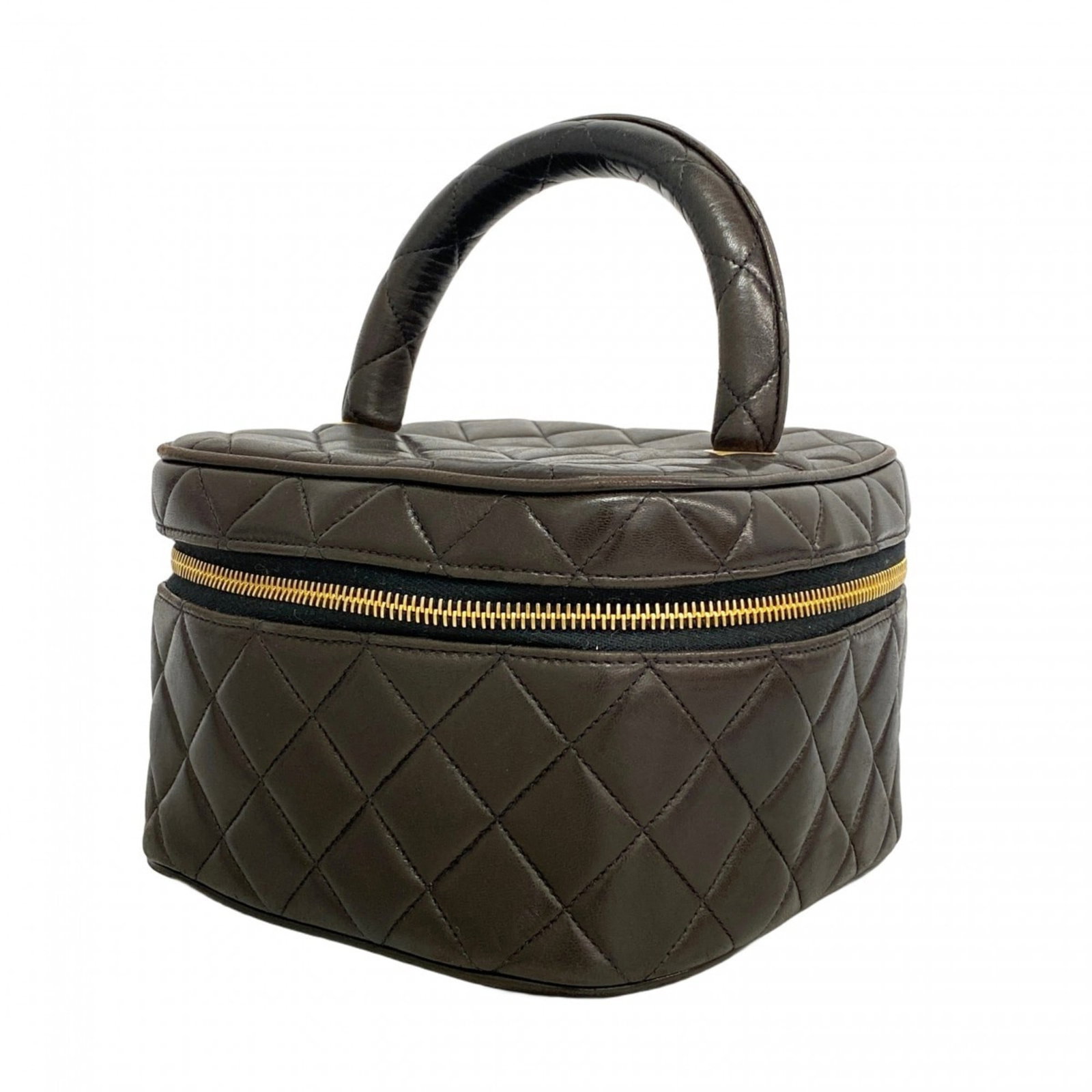 Chanel Vanity Bag in Leather: Chanel Vanity Bag in Leather A sleek and sophisticated Chanel vanity bag, crafted from luxurious lambskin leather in classic black, adds a touch of timeless elegance to any beauty routine. With its st