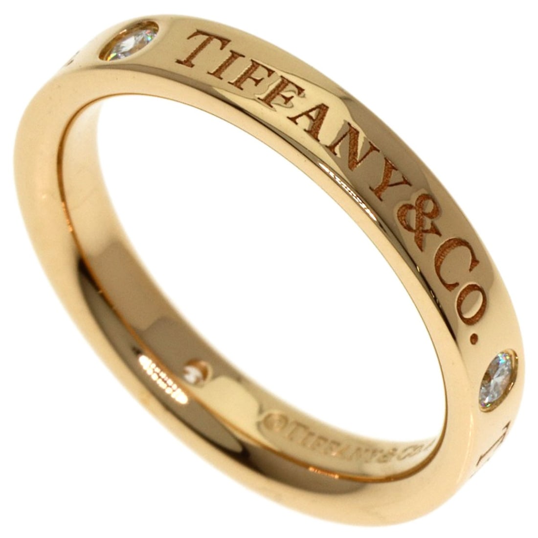 Gold TIFFANY&Co. Flat Band 3P Diamond Ring K18 Yellow: Gold TIFFANY&Co. Flat Band 3P Diamond Ring K18 Yellow A stunning Tiffany & Co. flat band ring, set with three brilliant diamonds in K18 yellow gold, adds a touch of timeless elegance to any outfit. Th