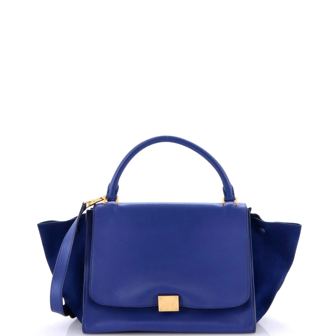 Celine Small Leather Trapeze Bag: Celine Small Leather Trapeze Bag Experience the timeless elegance of Celine's Small Leather Trapeze Bag, boasting sleek blue suede exterior and supple leather interior. Its classic design is elevated