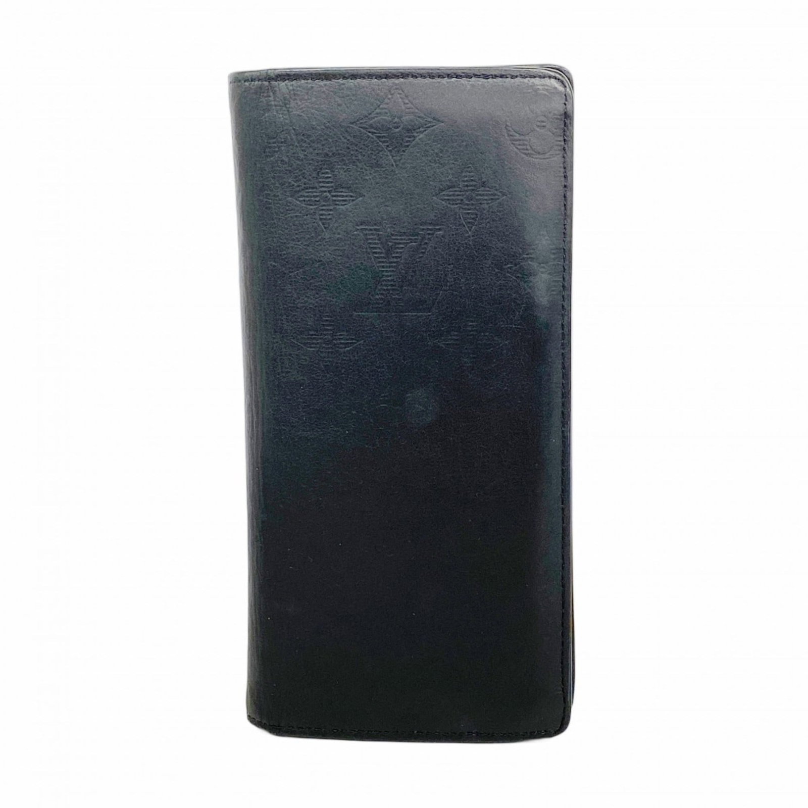 Louis Vuitton Bi-Fold Long Wallet: Louis Vuitton Bi-Fold Long Wallet A sleek and timeless accessory for the modern gentleman, this Louis Vuitton bi-fold long wallet boasts classic design and premium quality. With its durable black leat