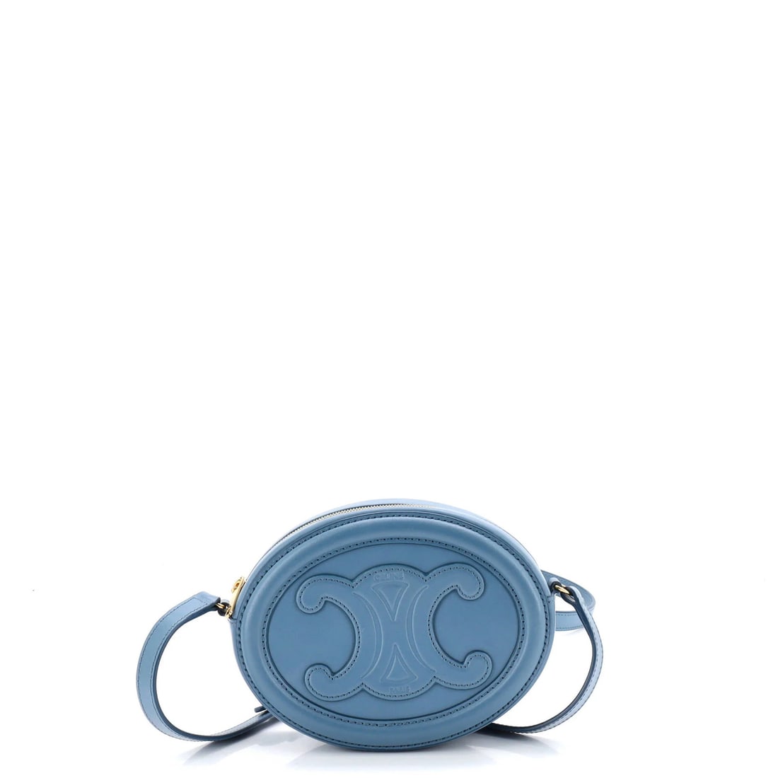 Celine Triomphe Oval Mini Crossbody Bag in Leather: Celine Triomphe Oval Mini Crossbody Bag in Leather Elevate your everyday style with the iconic Celine Triomphe Oval Mini Crossbody Bag in luxurious leather. This sleek, blue-hued mini bag boasts clean