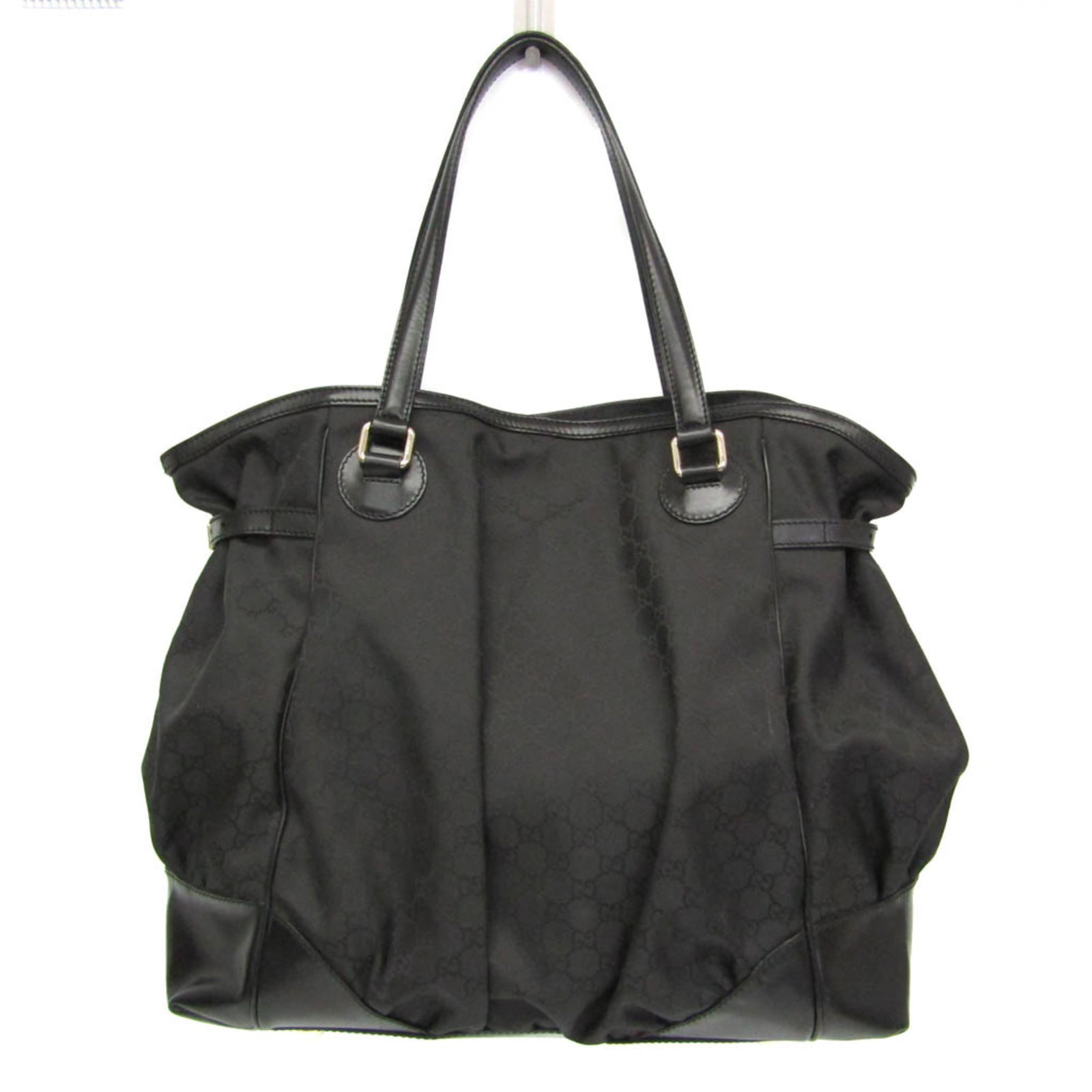 Gucci Tote Bag - Nylon and Leather: Gucci Tote Bag - Nylon and Leather Elevate your everyday style with this luxurious Gucci tote bag, crafted from durable nylon and supple leather. The magnetic snap closure and spacious interior