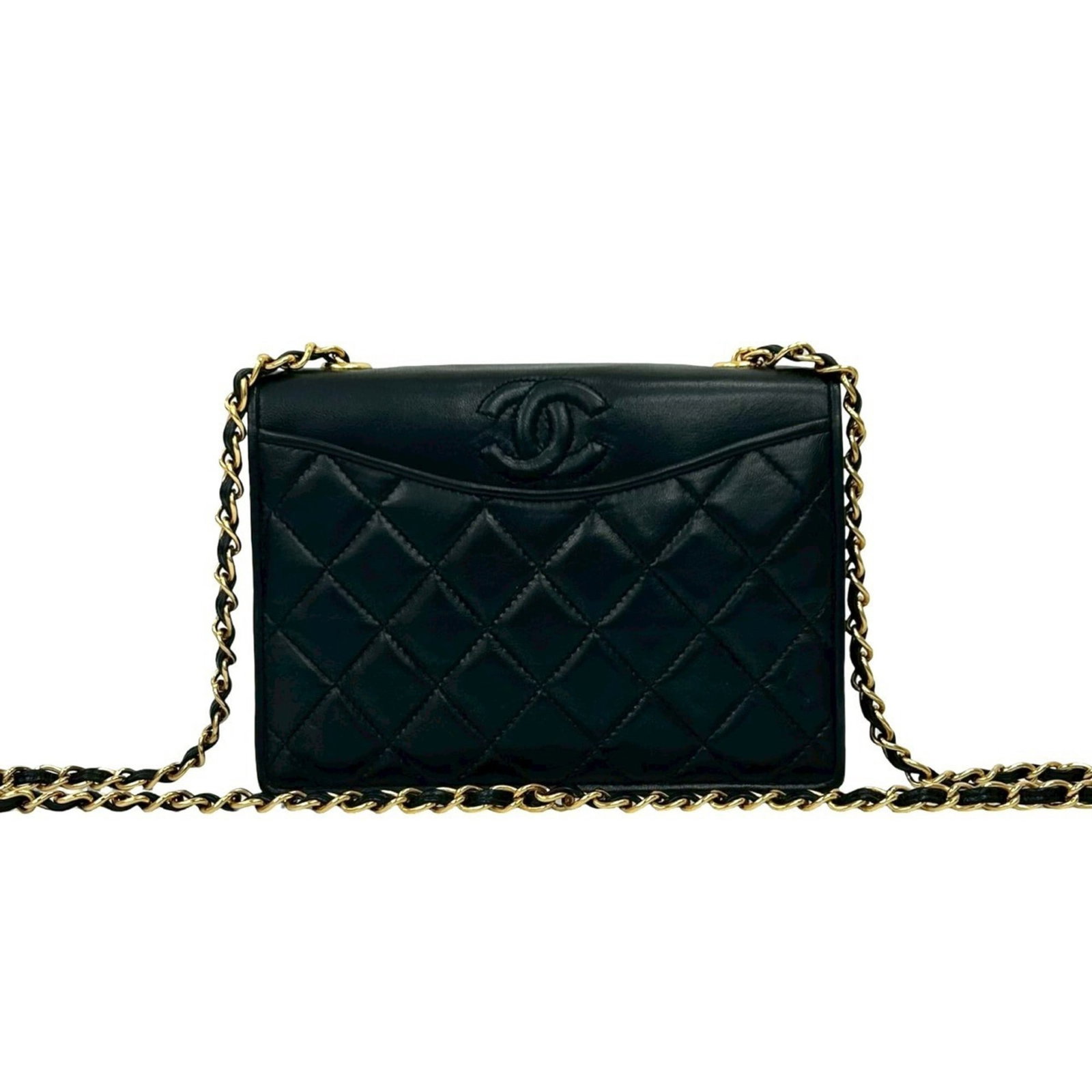 Chanel Shoulder Bag in Leather: Chanel Shoulder Bag in Leather A sleek and sophisticated Chanel shoulder bag, crafted from luxurious lambskin leather in classic black. With its timeless design and premium materials, this bag exudes