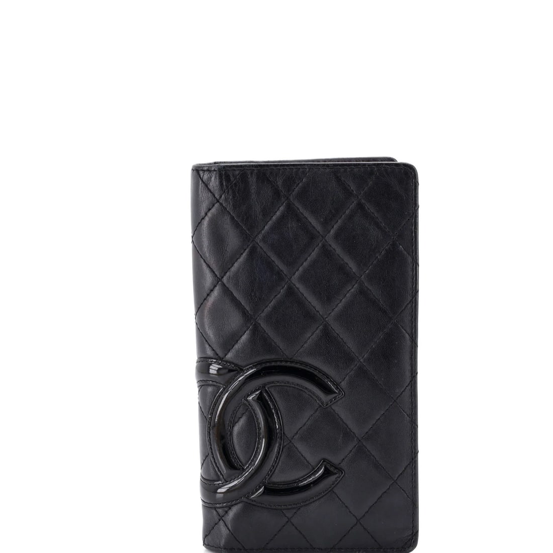 Chanel Quilted Calfskin Bifold Wallet Cambon: Chanel Quilted Calfskin Bifold Wallet Cambon A timeless piece from the iconic Chanel brand, this quilted calfskin bifold wallet Cambon boasts sleek black leather exterior and interior with a pop of fe
