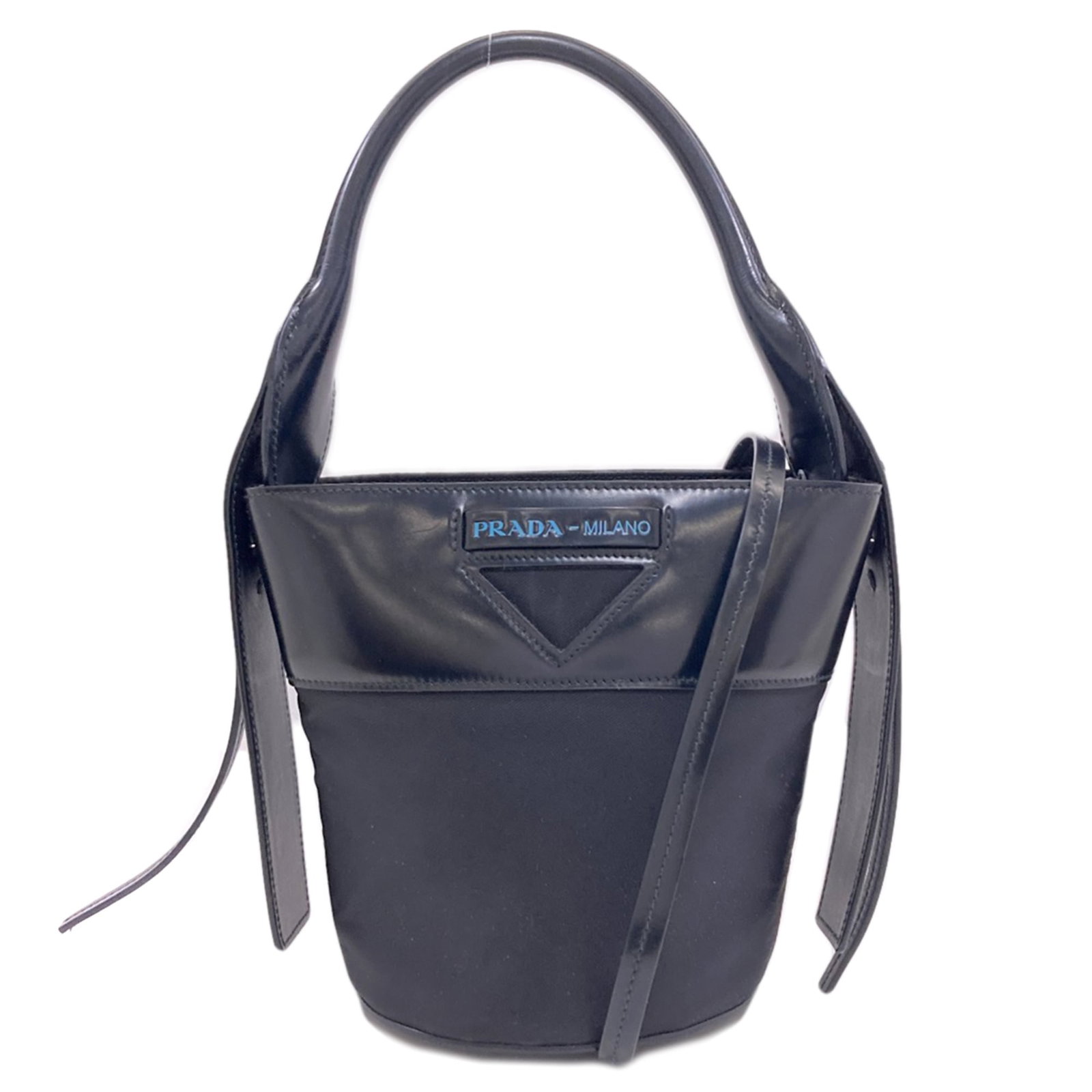 Prada 1BE015 Ouverture Bucket 2-Way Backpack/ Daypack Nylon/ Calf Leather Women's: Prada 1BE015 Ouverture Bucket 2-Way Backpack/ Daypack Nylon/ Calf Leather Women's A sleek and sophisticated Prada backpack, the Ouverture 1BE015 is a timeless piece perfect for daily adventures. Craft