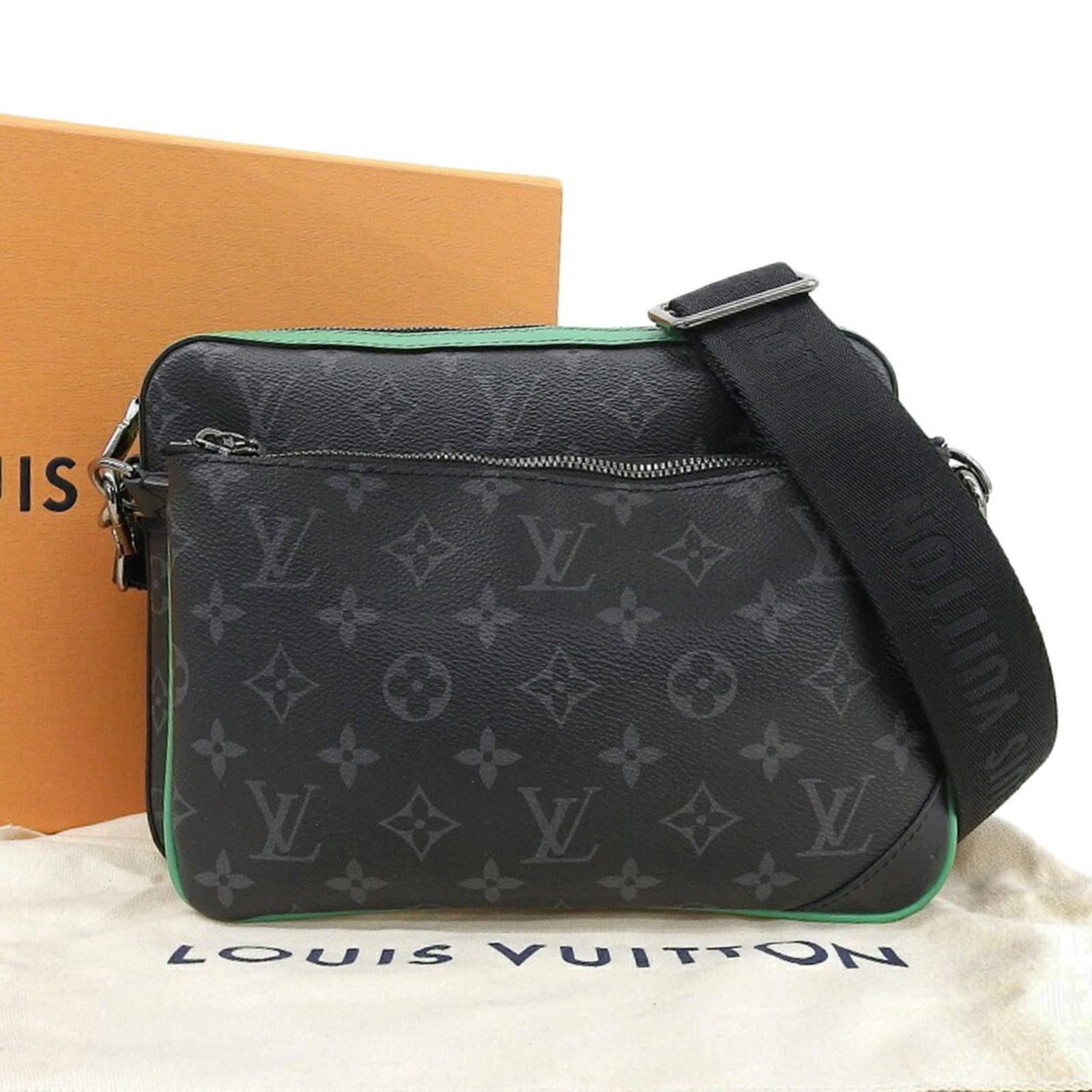 Louis Vuitton PVC Shoulder Bag: Louis Vuitton PVC Shoulder Bag A sleek and stylish Louis Vuitton PVC shoulder bag in vibrant green, adorned with the iconic Monogram Eclipse pattern, adds a touch of luxury to any outfit. With its dur