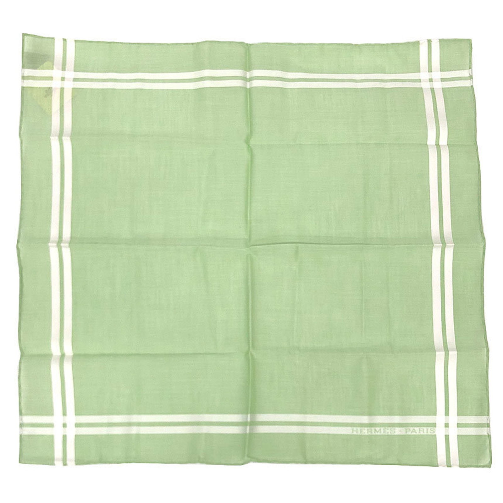 Hermes Cotton Handkerchief: Hermes Cotton Handkerchief A luxurious touch for everyday moments, this Hermes cotton handkerchief is crafted from high-quality materials and boasts a vibrant green hue that adds a pop of color to any
