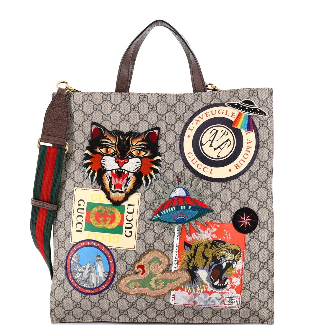 North Gucci Courrier Convertible Soft Open Tote GG Coated Canvas with Applique: North Gucci Courrier Convertible Soft Open Tote GG Coated Canvas with Applique Elevate your everyday style with the iconic Gucci Courrier Convertible Soft Open Tote, boasting a chic brown canvas exter