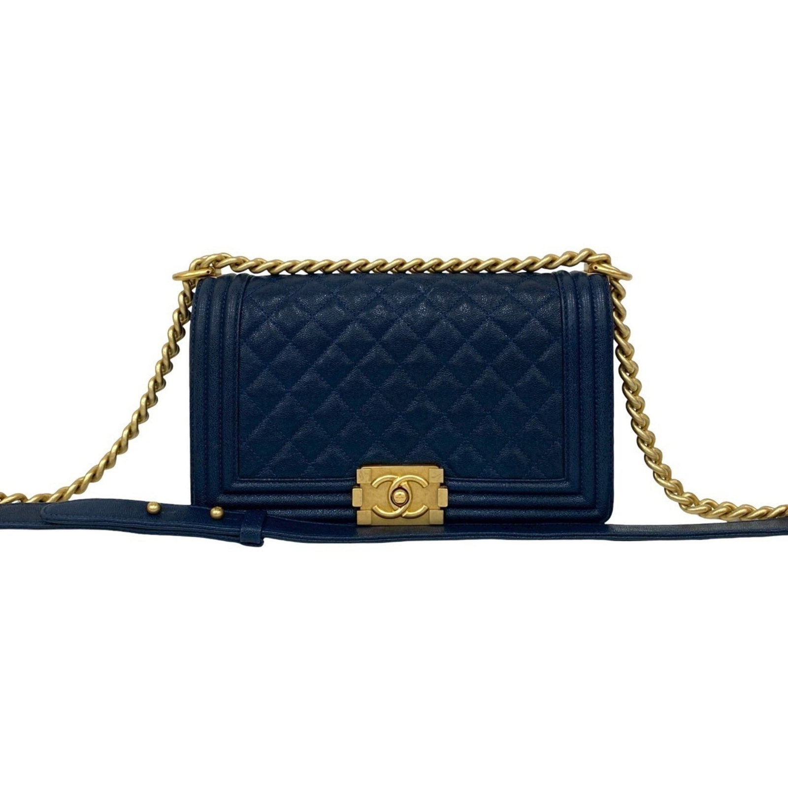 Chanel Shoulder Bag in Leather: Chanel Shoulder Bag in Leather A timeless Chanel shoulder bag in rich navy leather, boasting classic design and impeccable craftsmanship. With its sleek 15cm x 25cm size and sturdy 8cm height, this ve