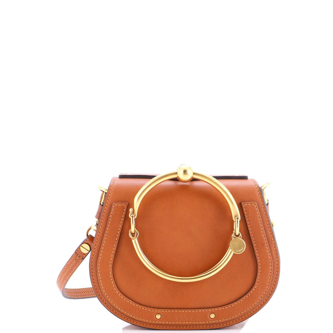 Chloe Nile Small Leather Crossbody Bag: Chloe Nile Small Leather Crossbody Bag Elevate your everyday style with the Chloe Nile Small Leather Crossbody Bag, boasting rich brown leather and suede interior in perfect harmony. With its adjustab