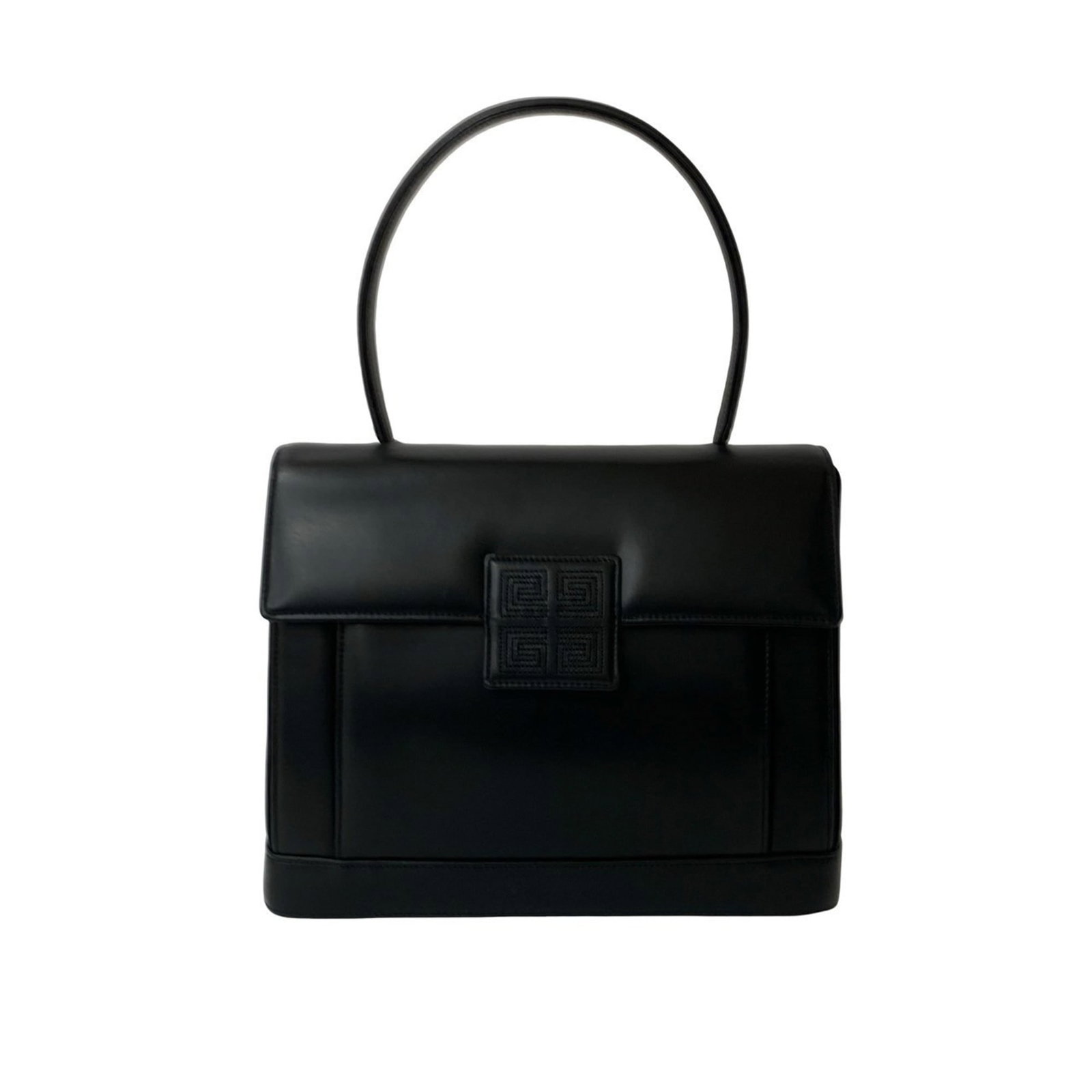 Givenchy Tote Bag in Leather: Givenchy Tote Bag in Leather A timeless piece from the iconic French fashion house Givenchy, this vintage leather tote bag boasts sleek black leather and classic design. With its spacious interior and