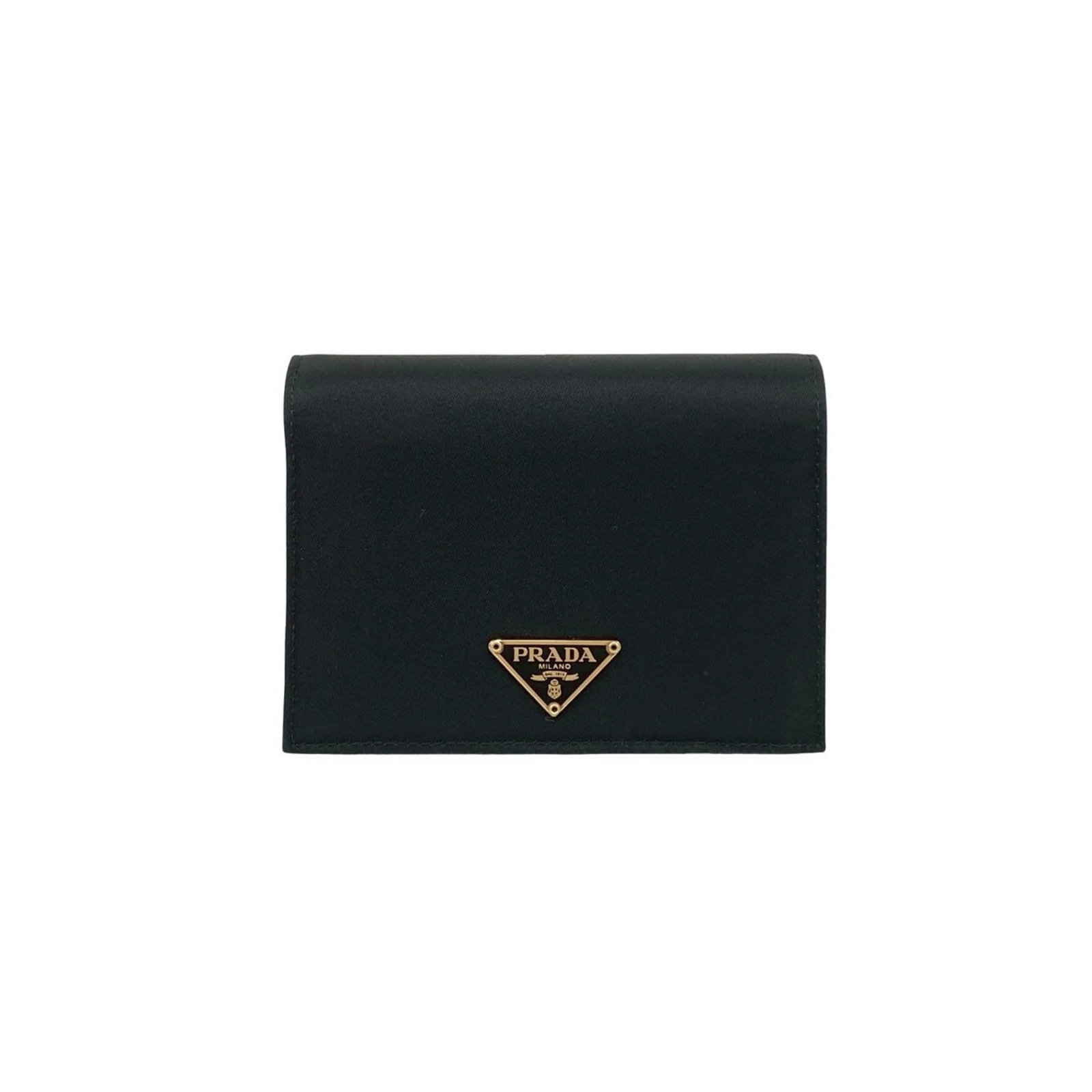 Prada Bi-Fold Wallet in Nylon and Leather: Prada Bi-Fold Wallet in Nylon and Leather A sleek and sophisticated bi-fold wallet from Prada, crafted with durable nylon and supple leather in classic black. The timeless design is both functional an