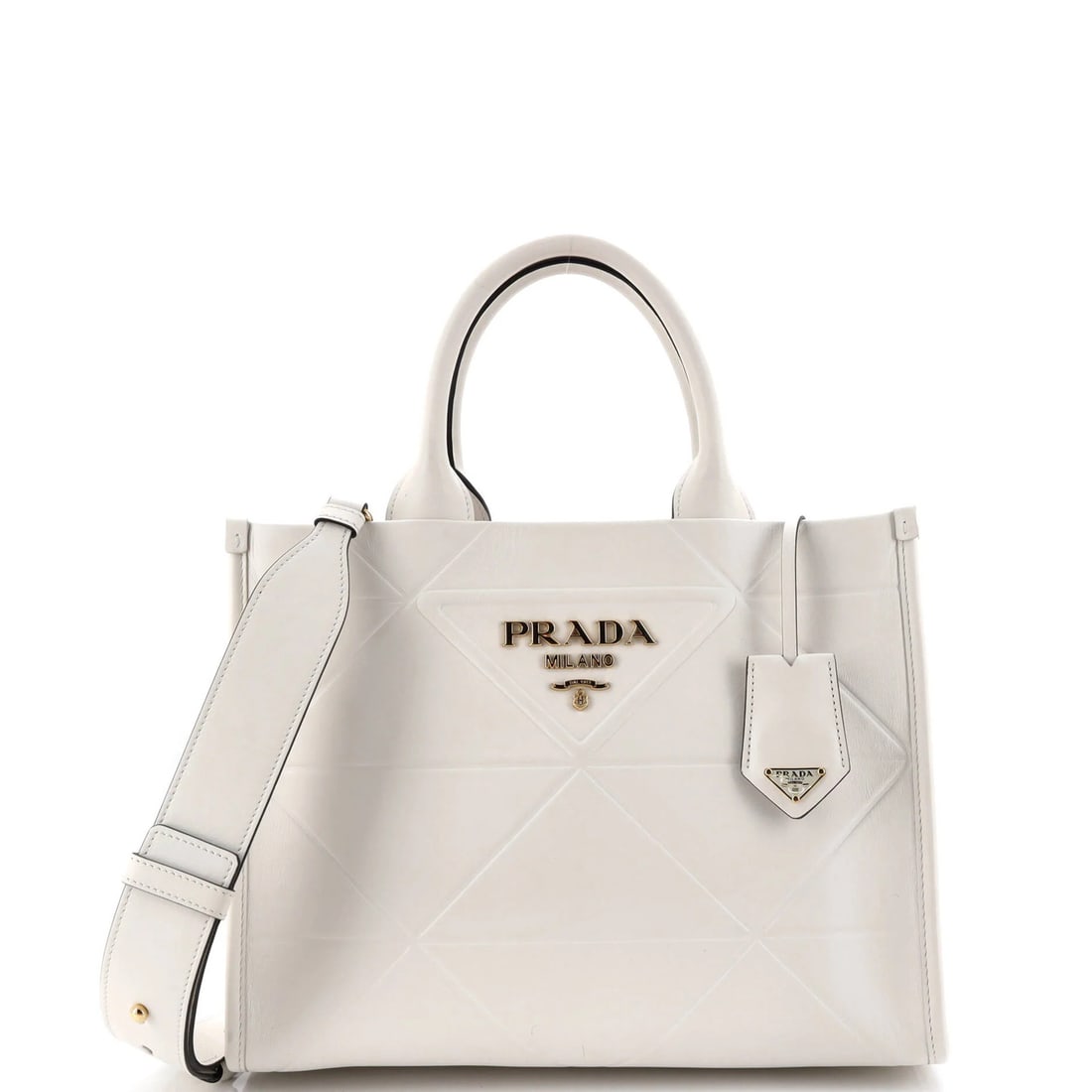 Prada Symbole Shopper Tote in Small Embossed Leather: Prada Symbole Shopper Tote in Small Embossed Leather The Prada Symbole Shopper Tote in small embossed leather is a timeless and sophisticated accessory that exudes luxury. With its crisp white exterio