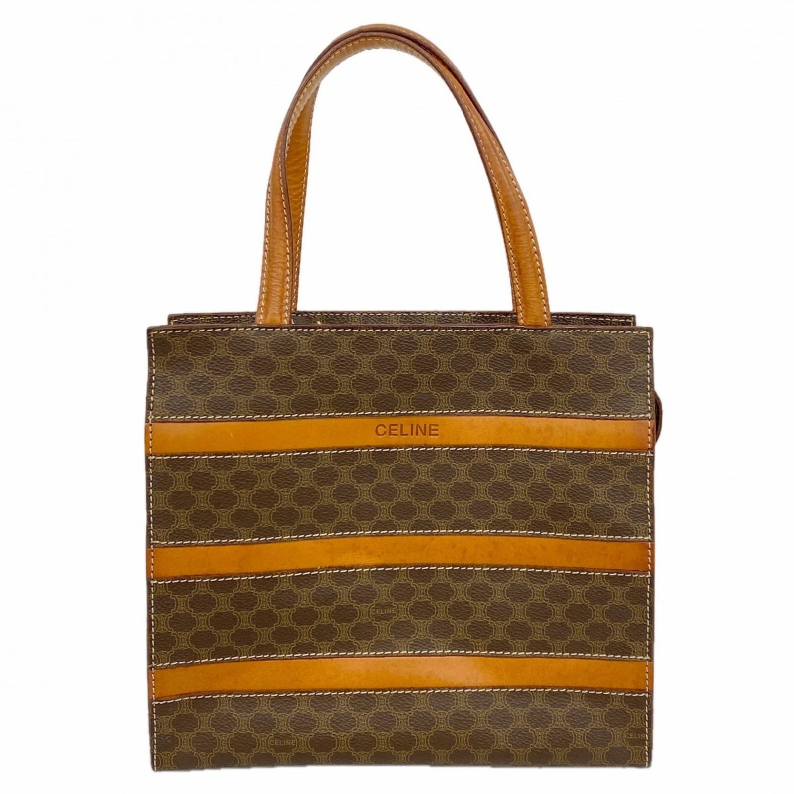Celine PVC Handbag: Celine PVC Handbag A stylish and timeless piece, this Celine PVC handbag boasts a rich brown color and gold hardware details that add a touch of sophistication to any outfit. With its durable PVC mate