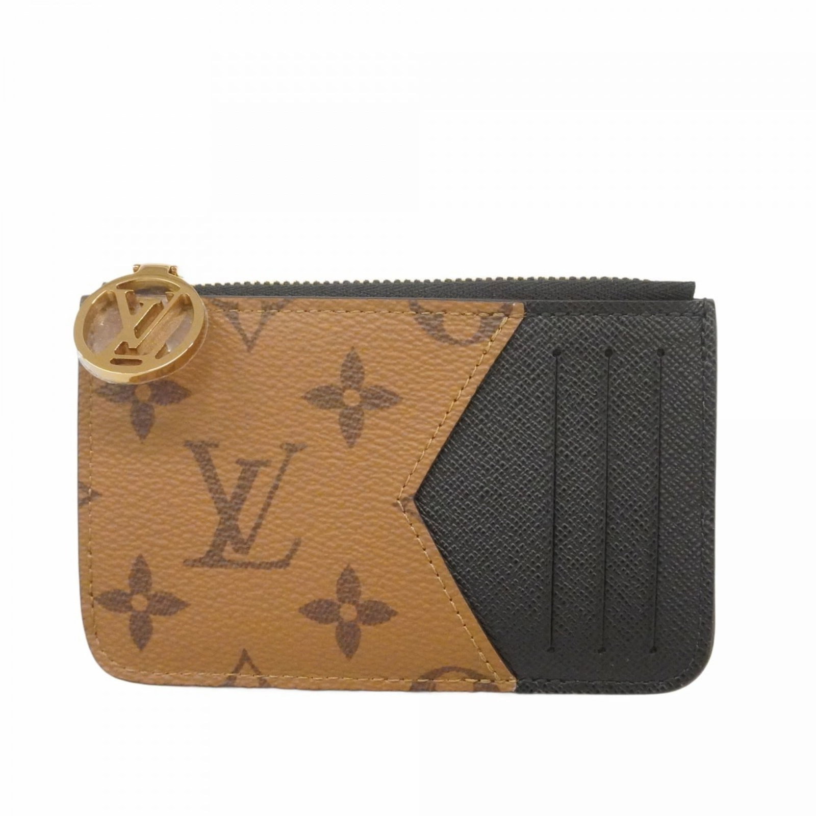 Louis Vuitton Coin Purse: Louis Vuitton Coin Purse A luxurious touch for any evening out, this Louis Vuitton coin purse boasts the iconic monogram pattern and sleek design that has become synonymous with high-end style. Made f