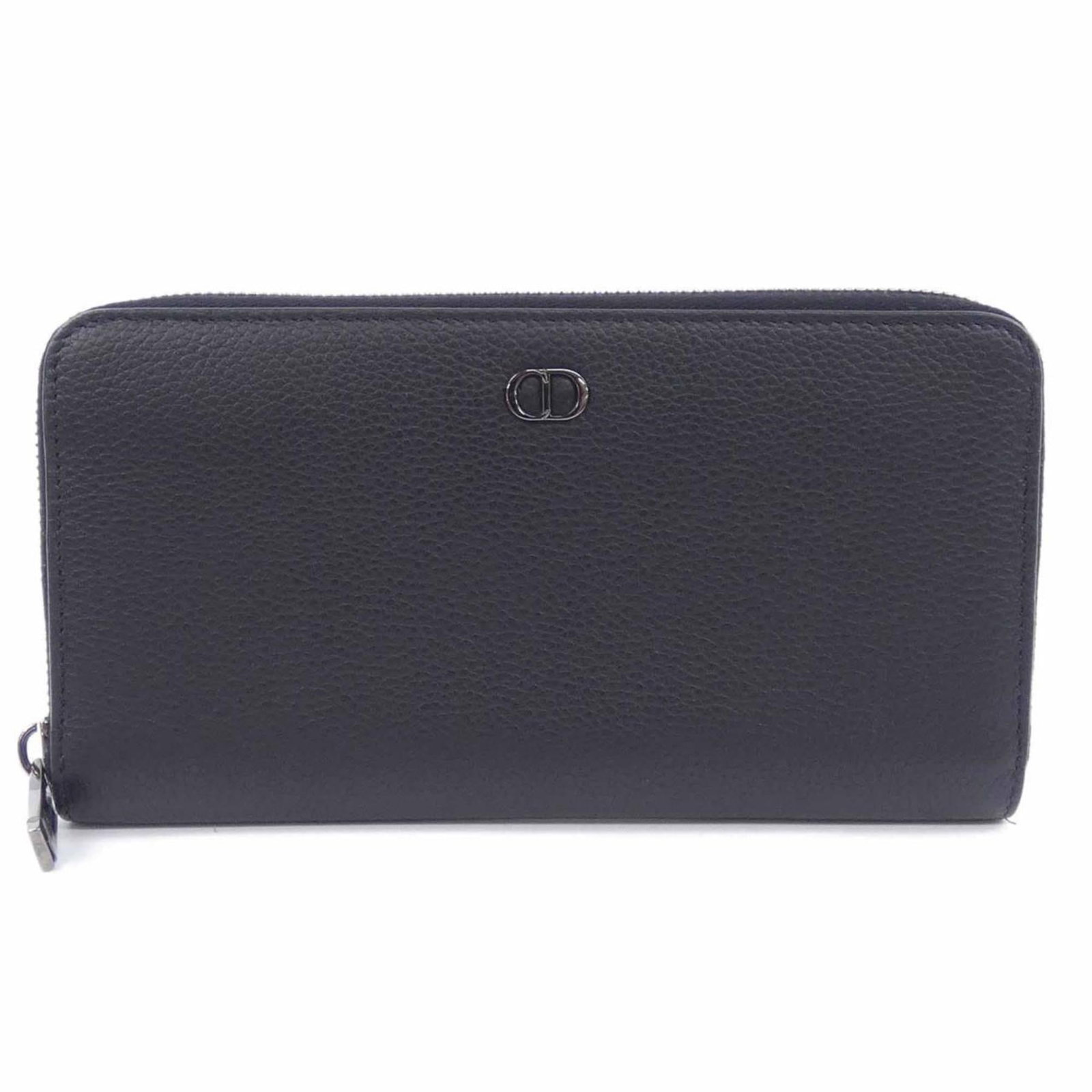 Christian Dior Bi-Fold Wallet: Christian Dior Bi-Fold Wallet A sleek and sophisticated accessory for the modern man, this Christian Dior bi-fold wallet boasts a classic design with clean lines and a timeless black finish. With its
