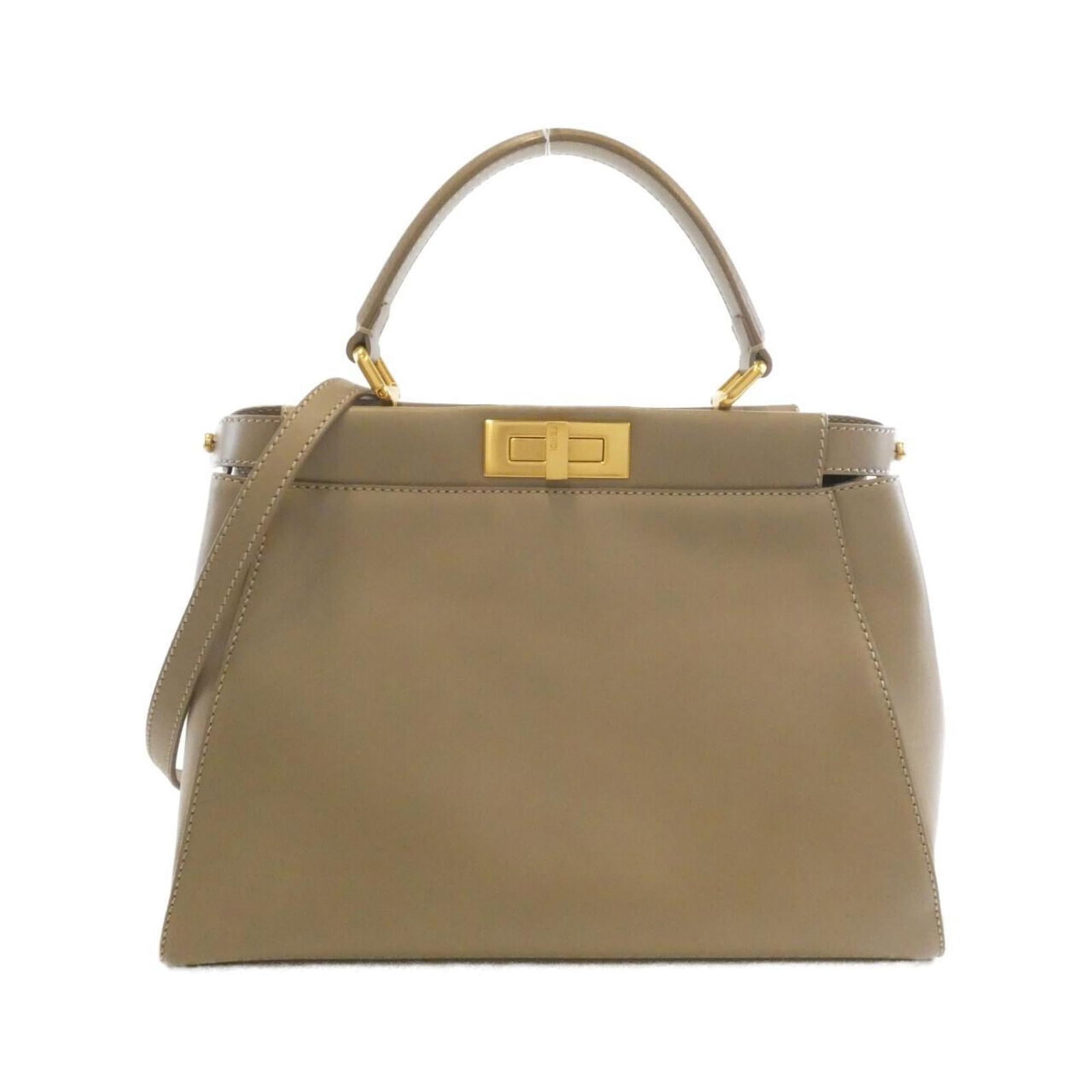Leather Fendi Handbag: Leather Fendi Handbag A timeless and sophisticated addition to any woman's wardrobe, this pre-owned Fendi leather handbag boasts rich beige calfskin and gold hardware, exuding classic Italian elegance