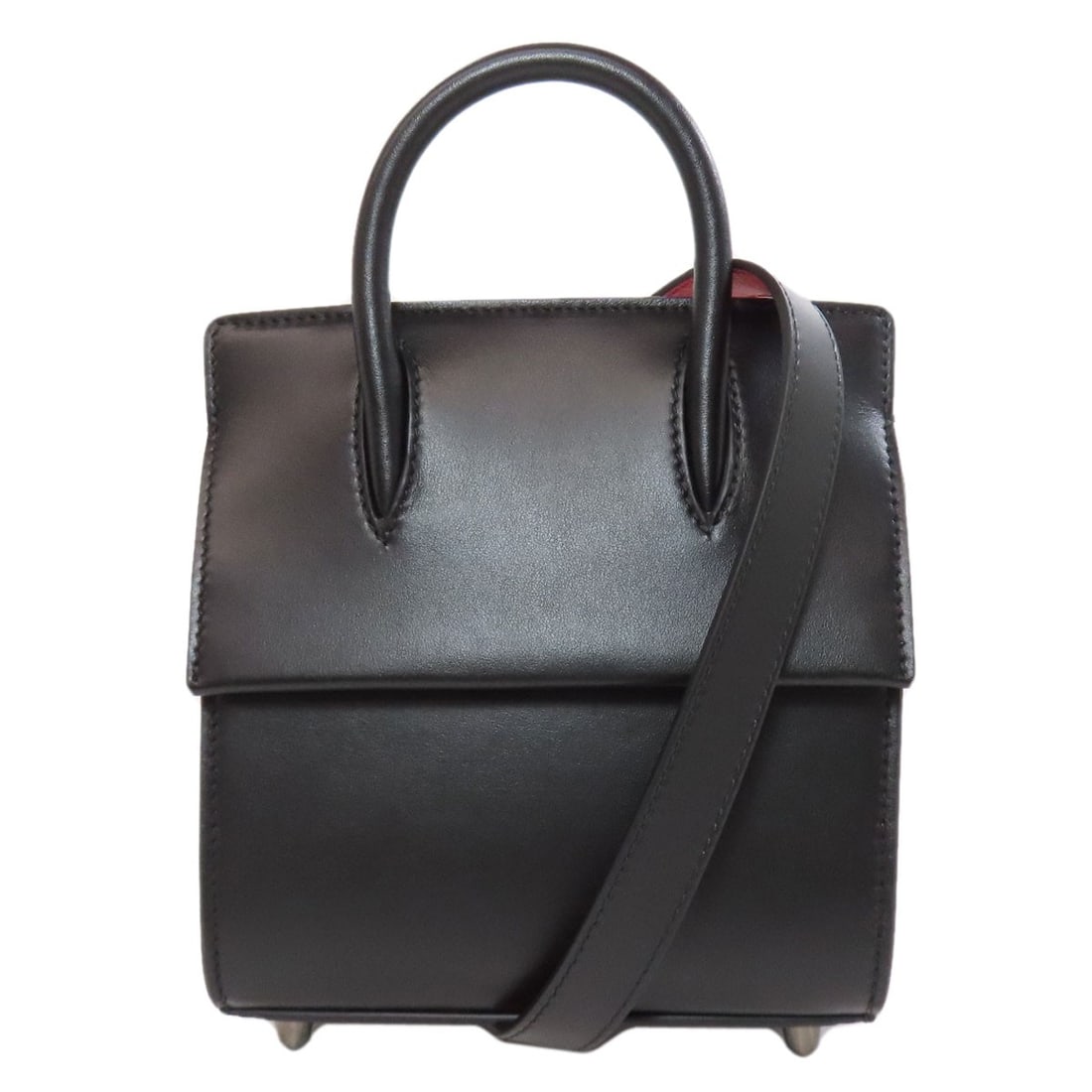 Calf Christian Louboutin 2WAY Handbag: Calf Christian Louboutin 2WAY Handbag The Calf Christian Louboutin 2WAY Handbag is a sleek and sophisticated accessory that exudes luxury. Its black calf exterior and signature red sole make for a str