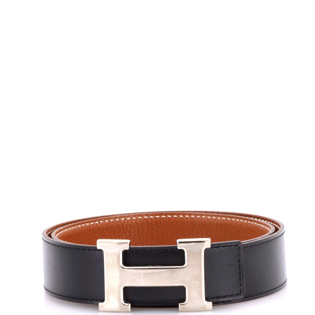 Hermes Constance Reversible Leather Belt - Medium: Hermes Constance Reversible Leather Belt - Medium The iconic Constance Reversible Leather Belt from Herm?s is a timeless accessory that exudes sophistication and elegance. With its sleek black exterio